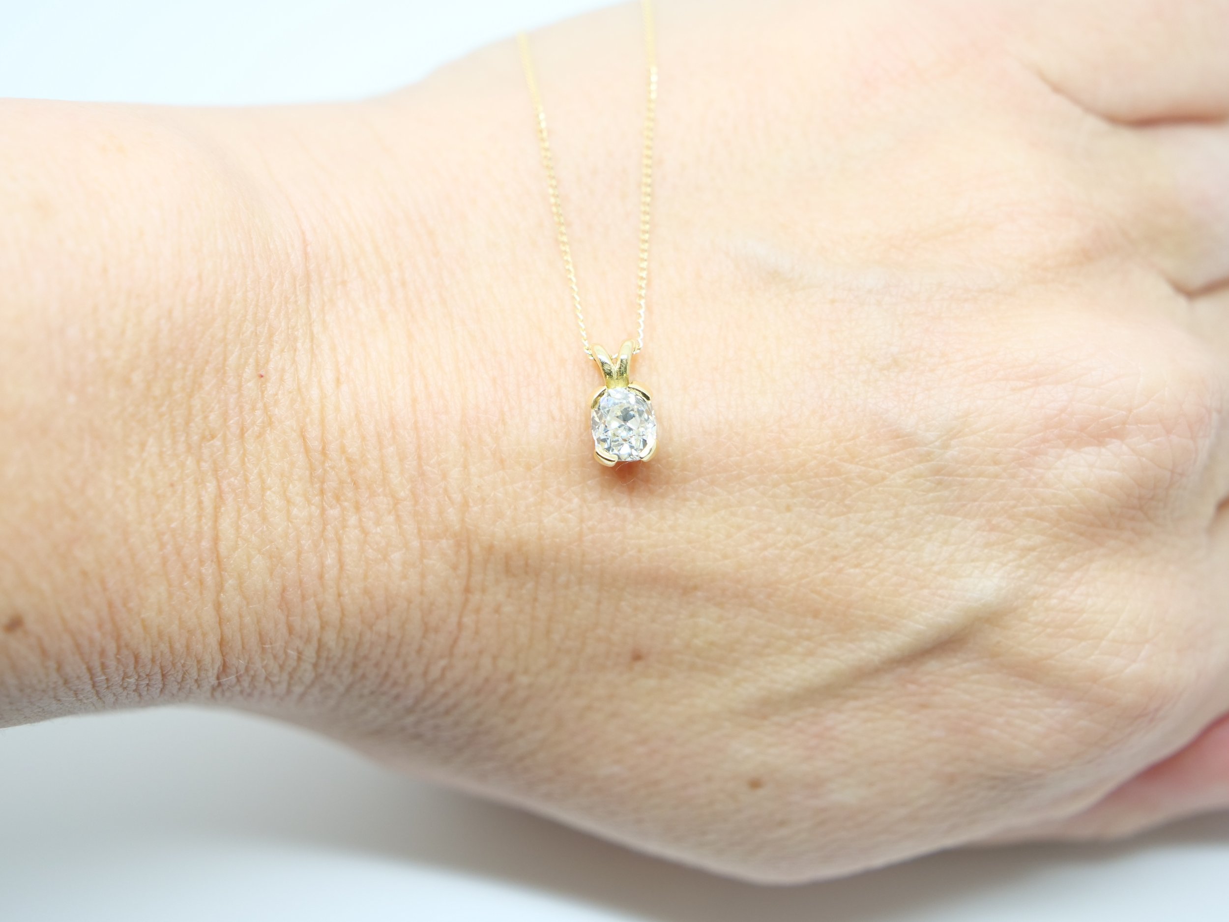 Gorgeous 18ct gold diamond solitaire pendant and chain, set with a beautiful old mine cut diamond of 0.87ct. With 16” 18ct gold chain.
