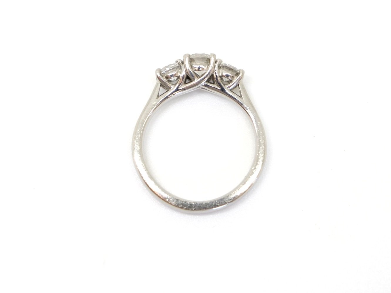 Lovely platinum 1ct diamond three stone ring, set with three brilliant cut diamonds. Centre stone approximately 0.5ct, with a further 0.25ct diamond to each side.