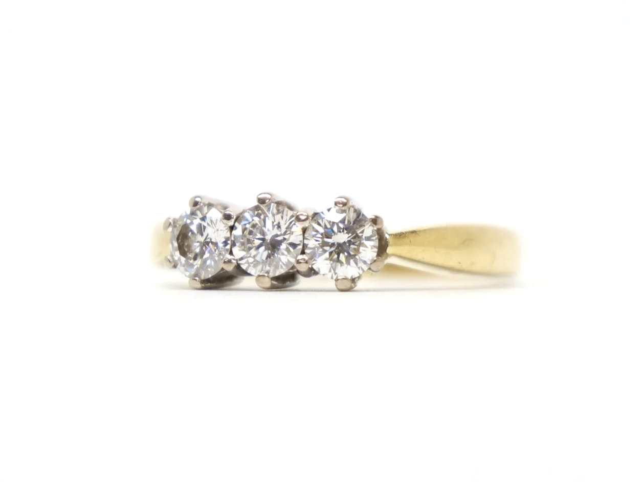 18ct yellow gold three-stone diamond ring