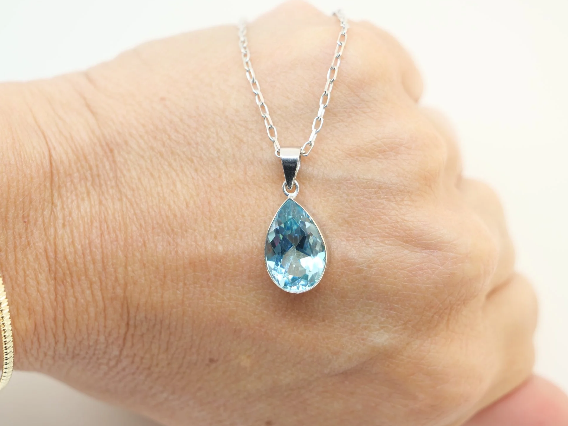 8ct gold blue topaz pendant necklace, pear cut teardrop design