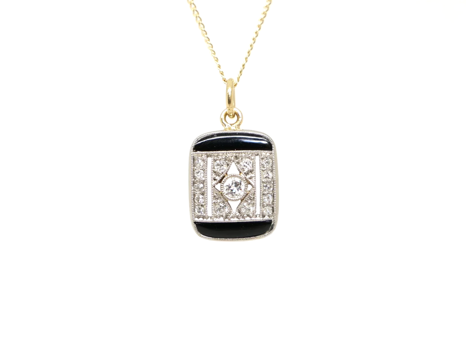 Art Deco onyx and diamond pendant, set in platinum and 18ct gold