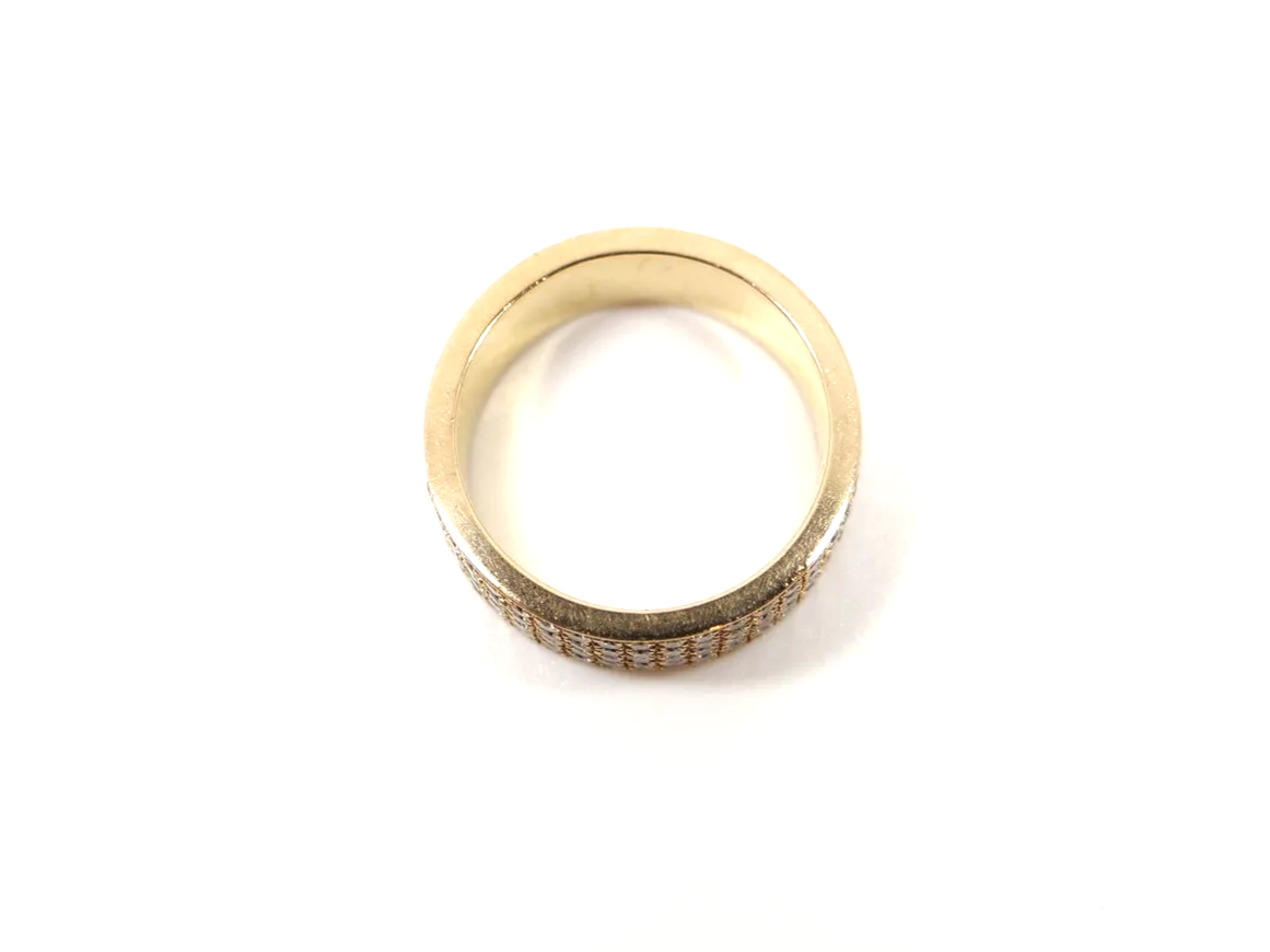 18ct yellow gold full eternity ring set with four continuous rows of round brilliant cut diamonds