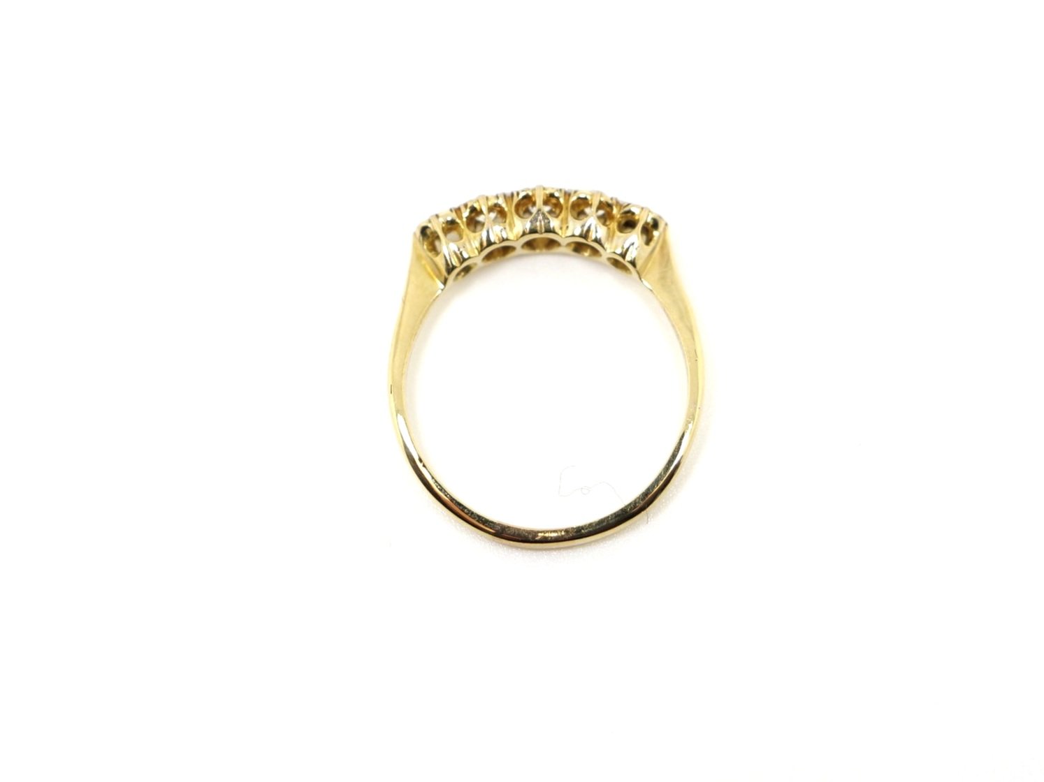 Pretty vintage 18ct gold ring, set with five old cut diamonds. Diamonds have a pretty platinum setting that enhances the appearance and size of the diamonds.