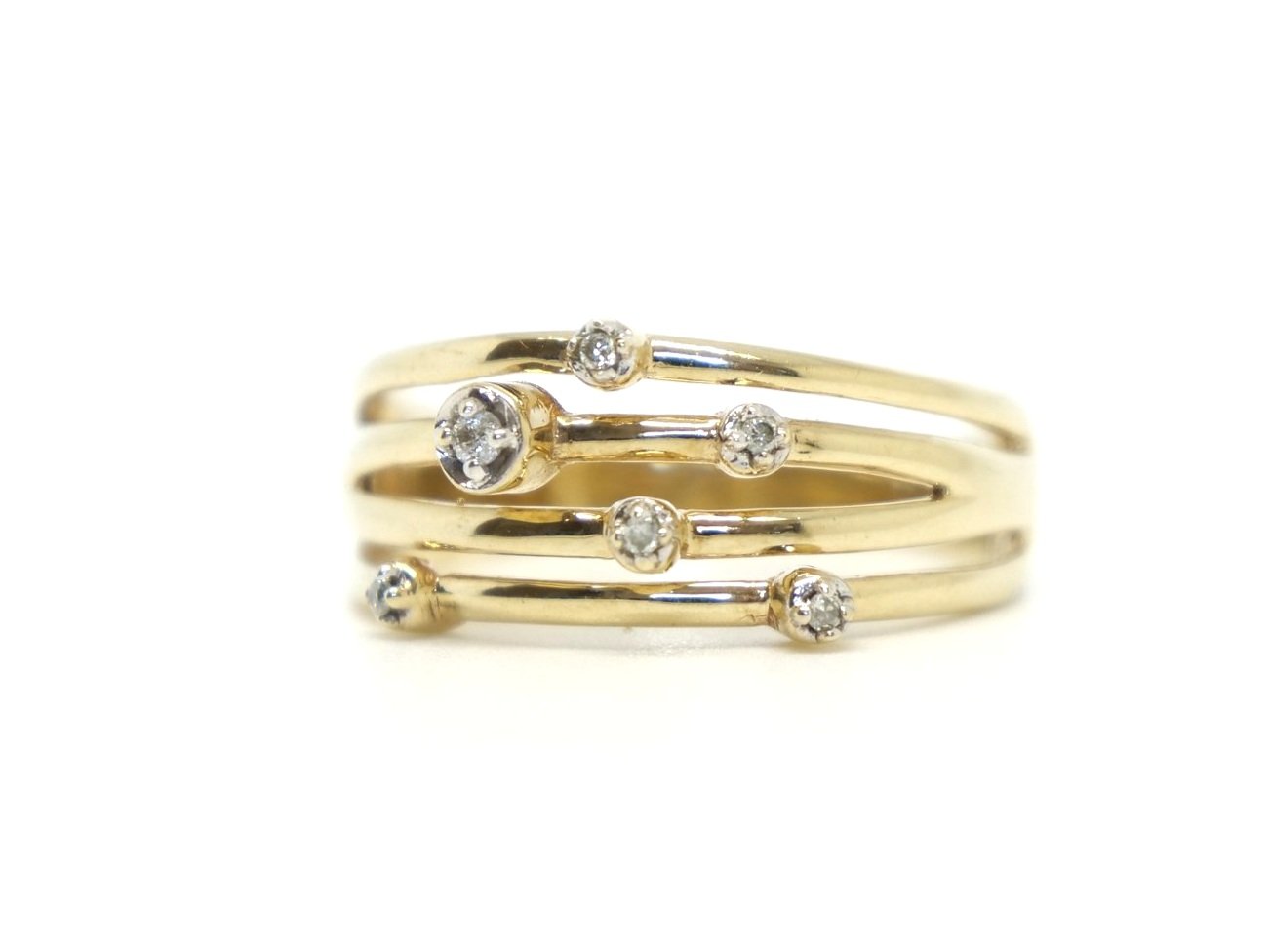 Contemporary designer style 9ct gold bubble style ring, with a four band design and set with six diamonds.