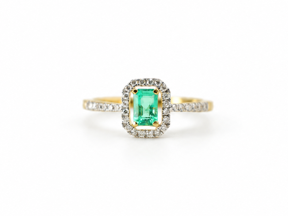18ct gold emerald and diamond halo ring, emerald cut centre stone