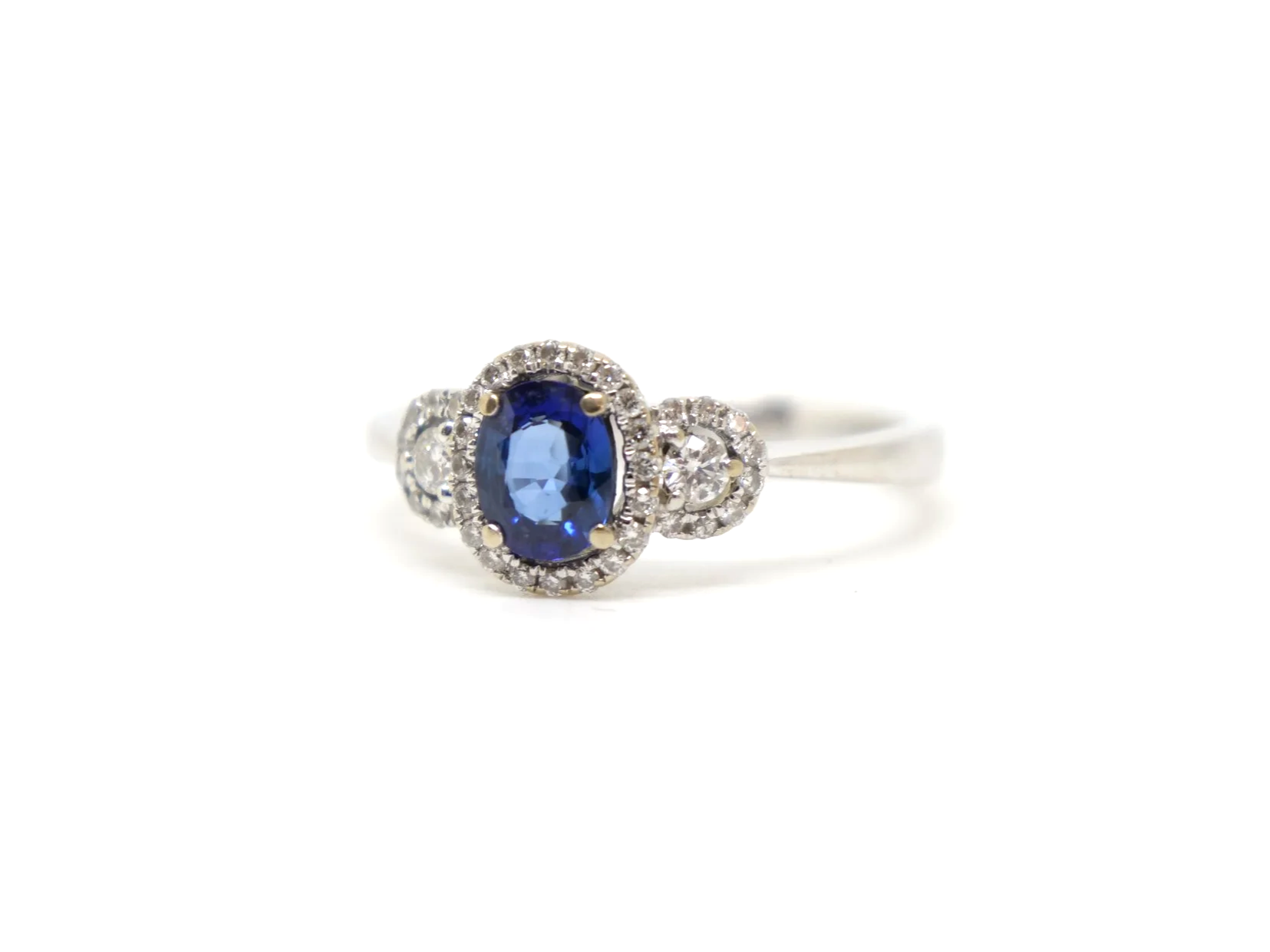 18ct gold sapphire and diamond halo cluster ring