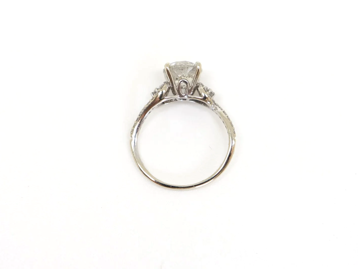 18ct gold diamond solitaire ring, 1.38ct central brilliant cut diamond with diamond set sides, UK size I