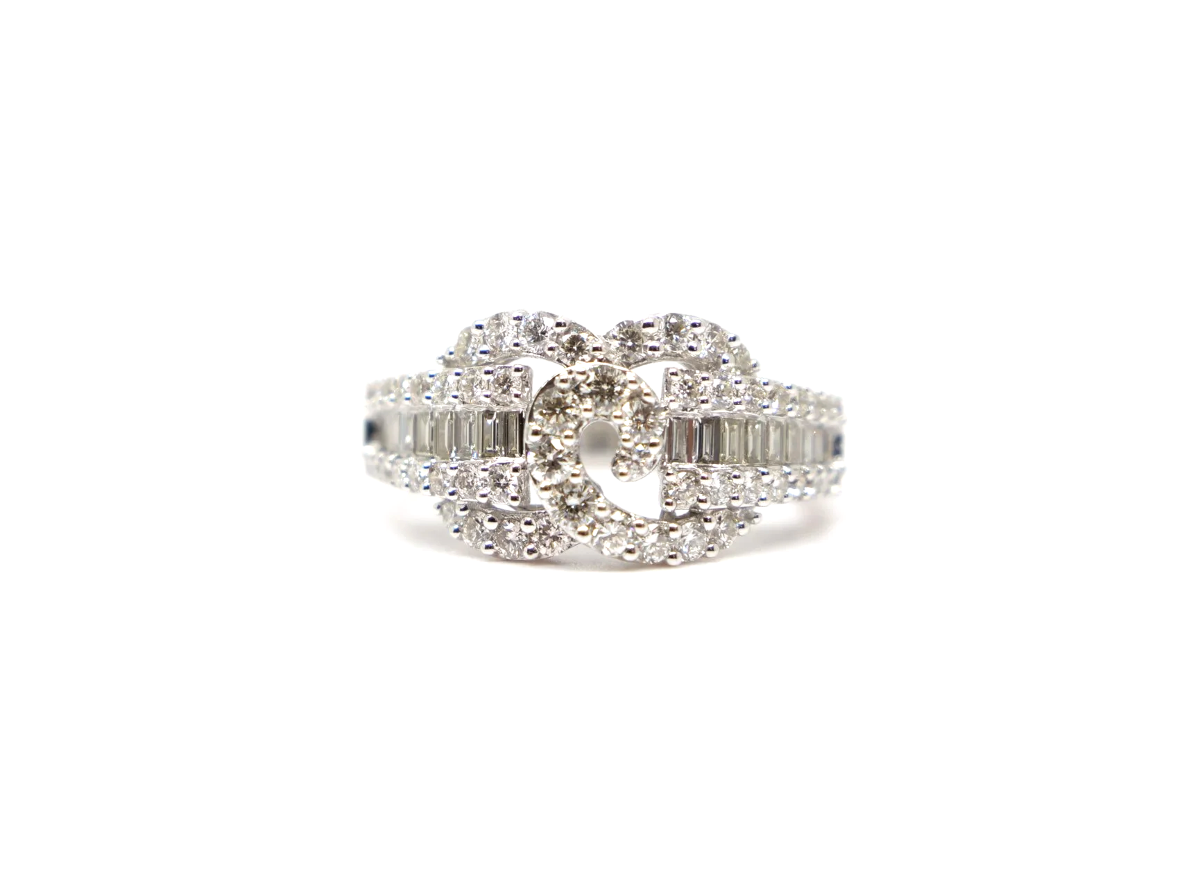 platinum diamond statement ring set with a combination of round brilliant and baguette cut diamonds totalling 1.258 carats.