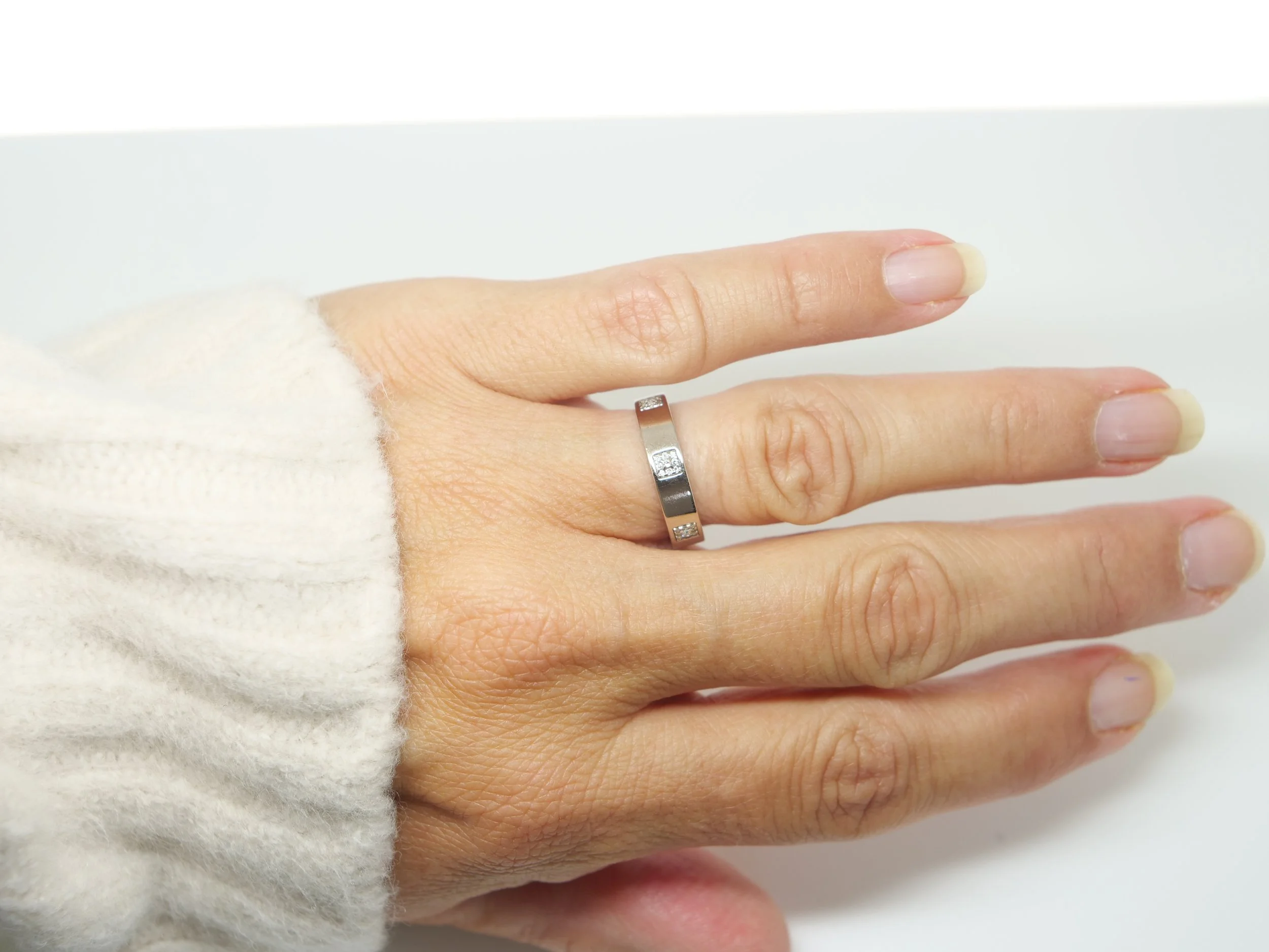 18ct white gold diamond band ring, square pavé diamond panels around a polished band