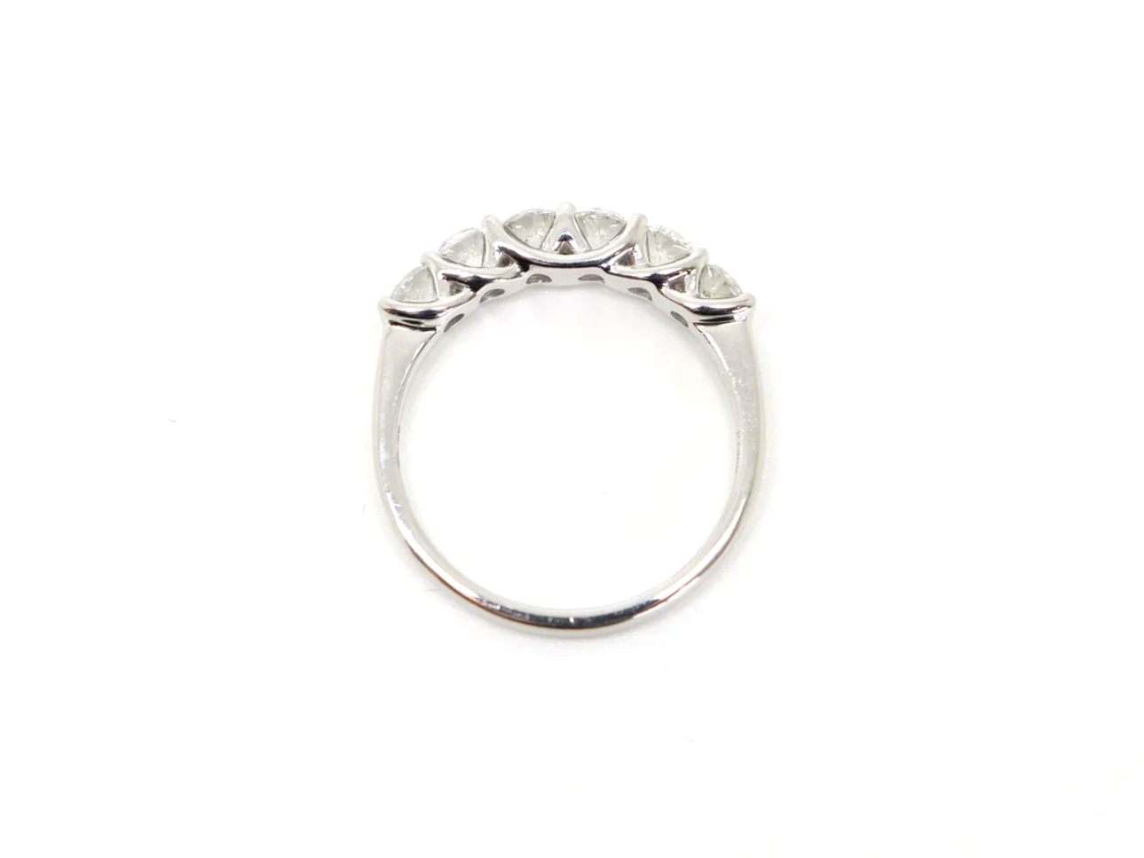 Classic platinum diamond half eternity ring, set with six brilliant cut diamonds with a total diamond weight of 1ct.