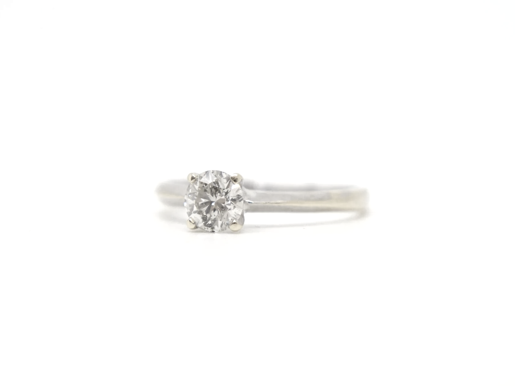 A clean, classic diamond solitaire in 14ct gold with a 0.5ct diamond
