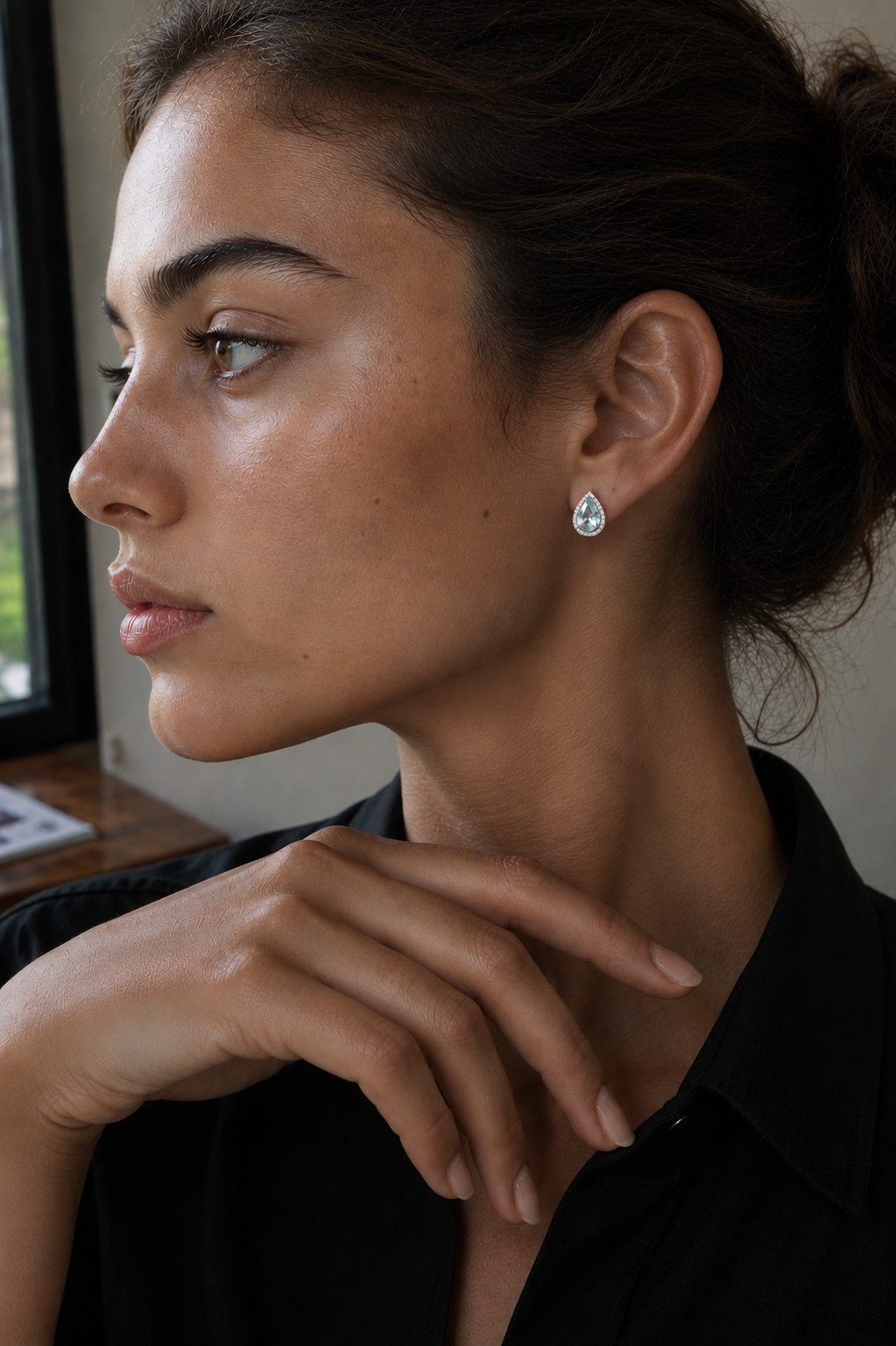 18ct aquamarine pear halo earrings.png