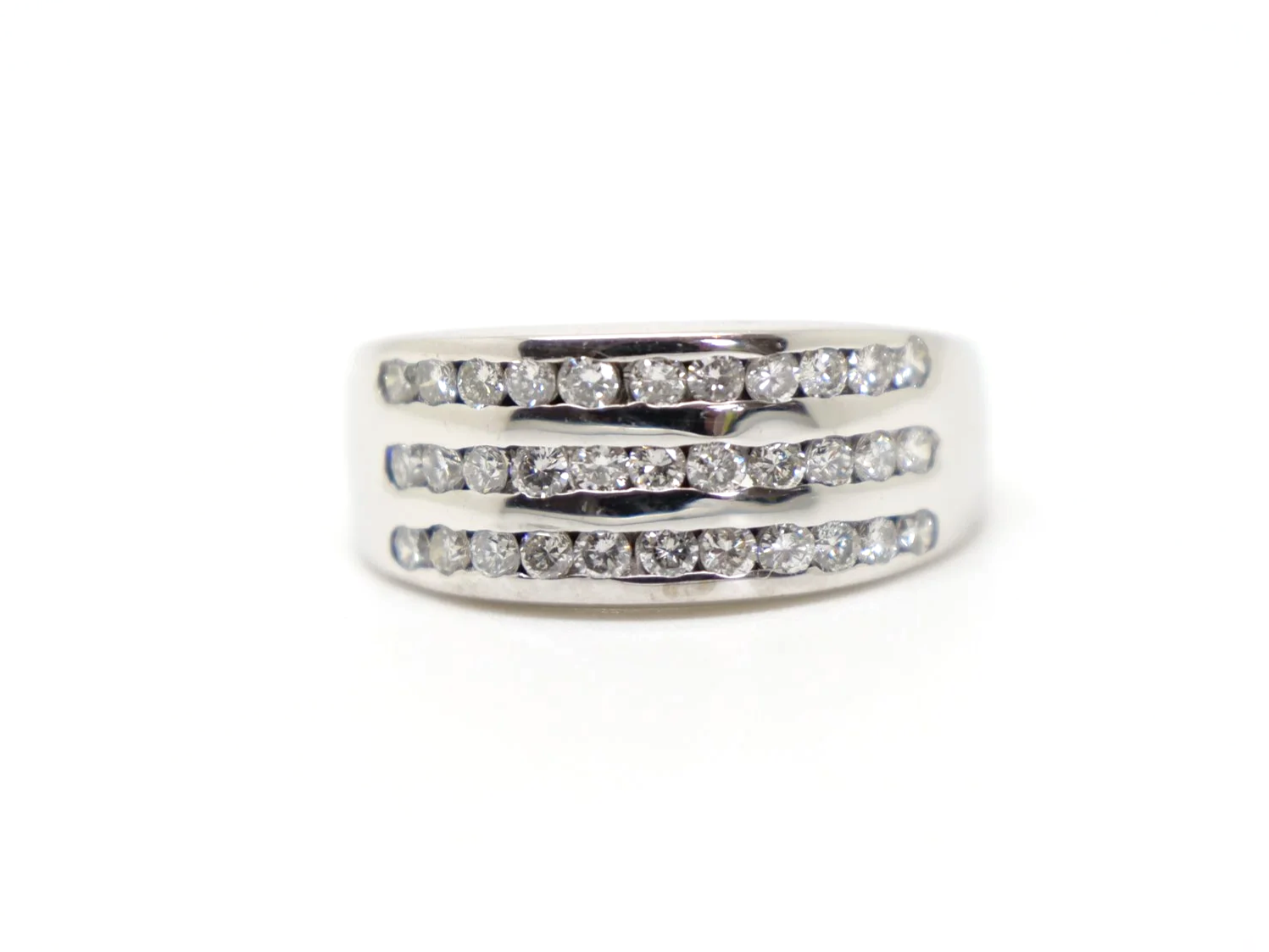 Lovely 18ct gold wide band half eternity ring, set with three rows of brilliant cut diamonds.