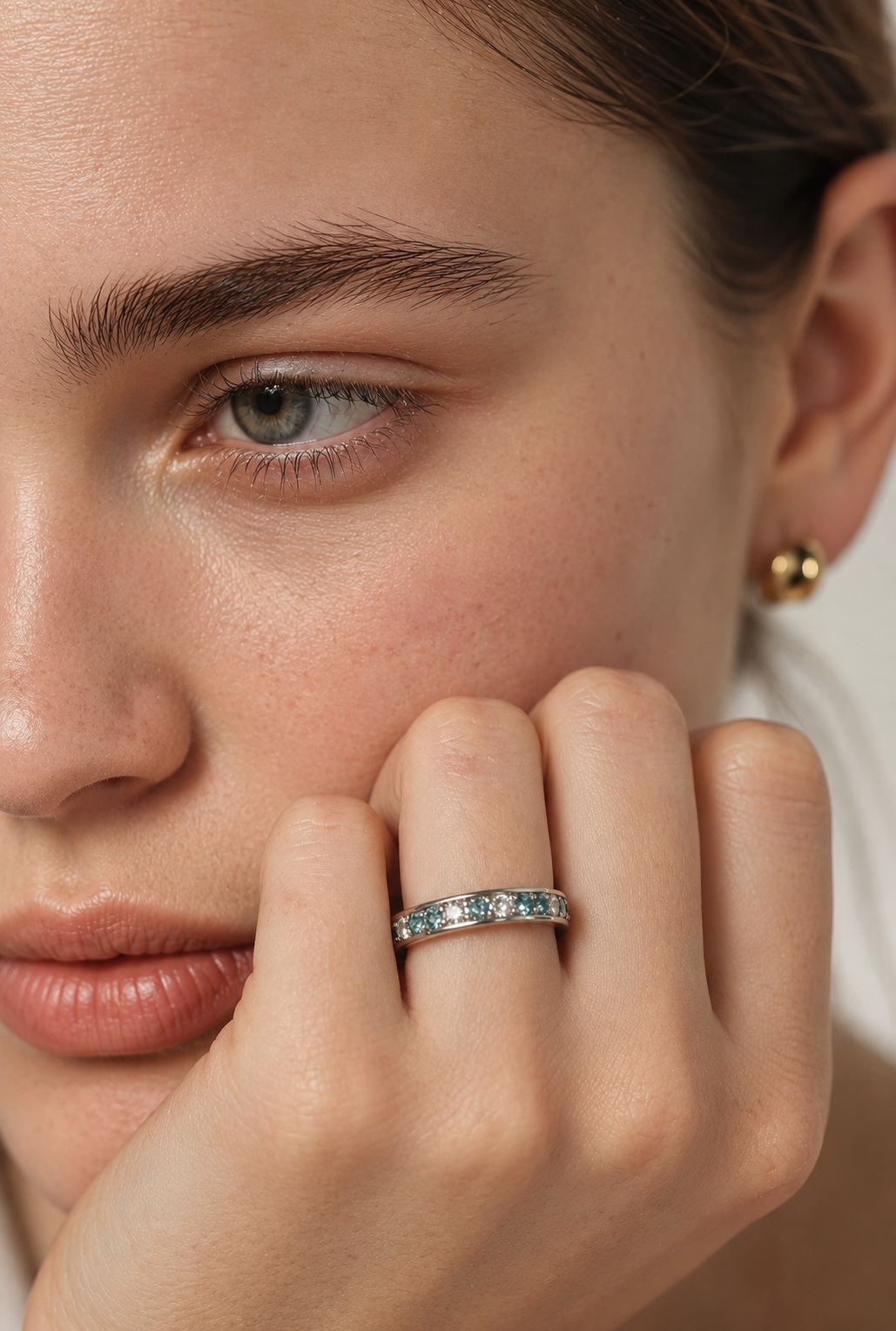 An 18ct white gold eternity ring alternating brilliant-cut white and blue diamonds, 0.59ct total. UK size I½. A rare vintage find, ready to ship.