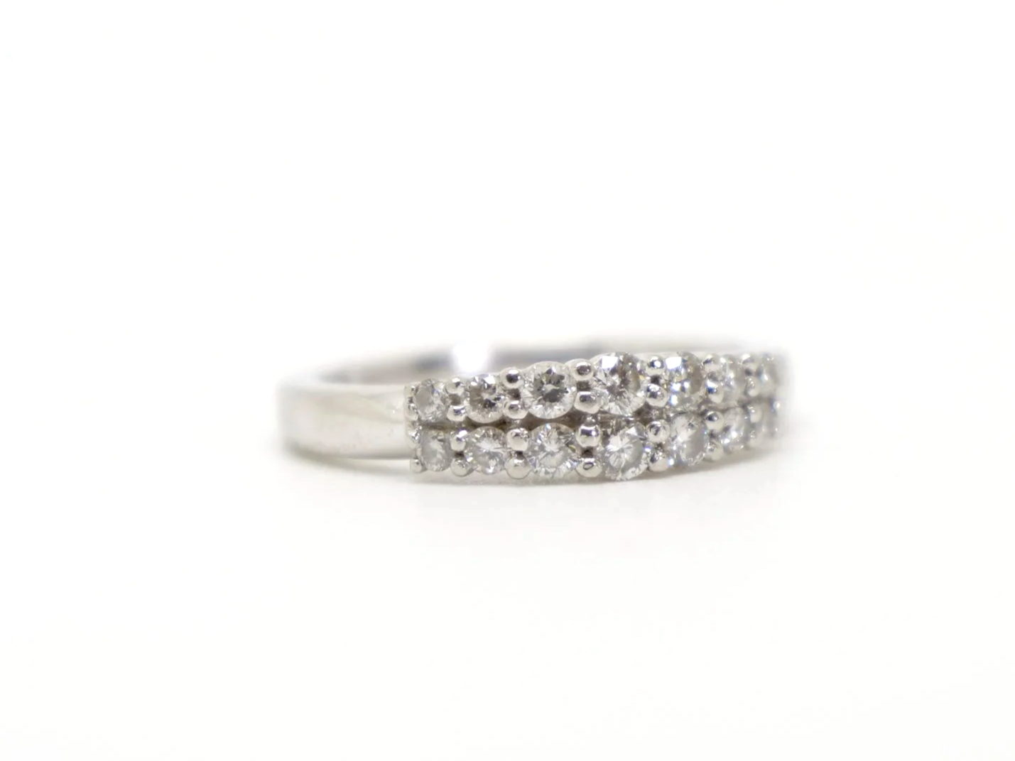 Lovely 18ct gold diamond half eternity ring, set with two rows of graduated diamonds. Approximately 0.34ct diamonds total.