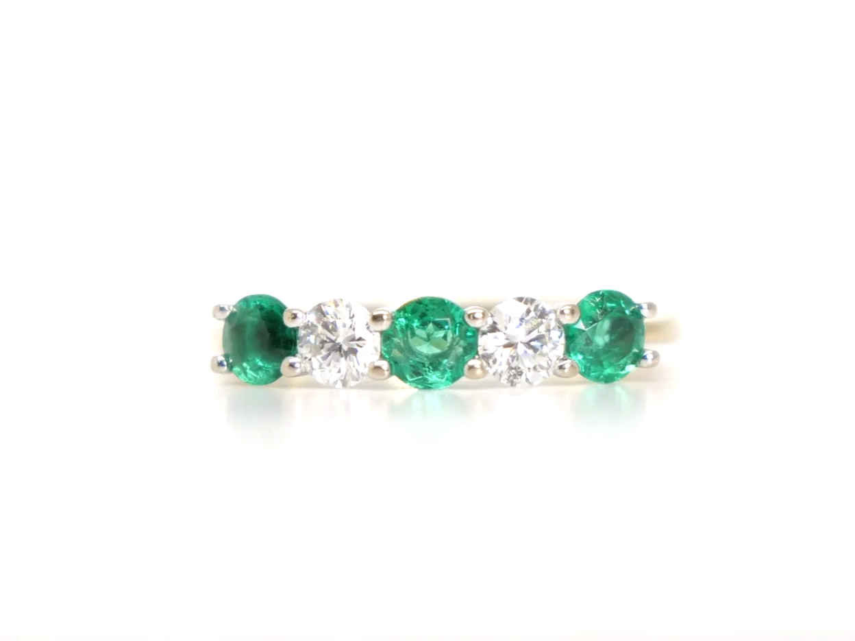 Lovely 18ct gold emerald and diamond five stone ring.