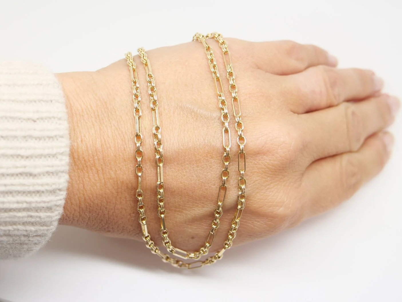 9ct gold Figaro chain with alternating belcher and bar links, 24 inches