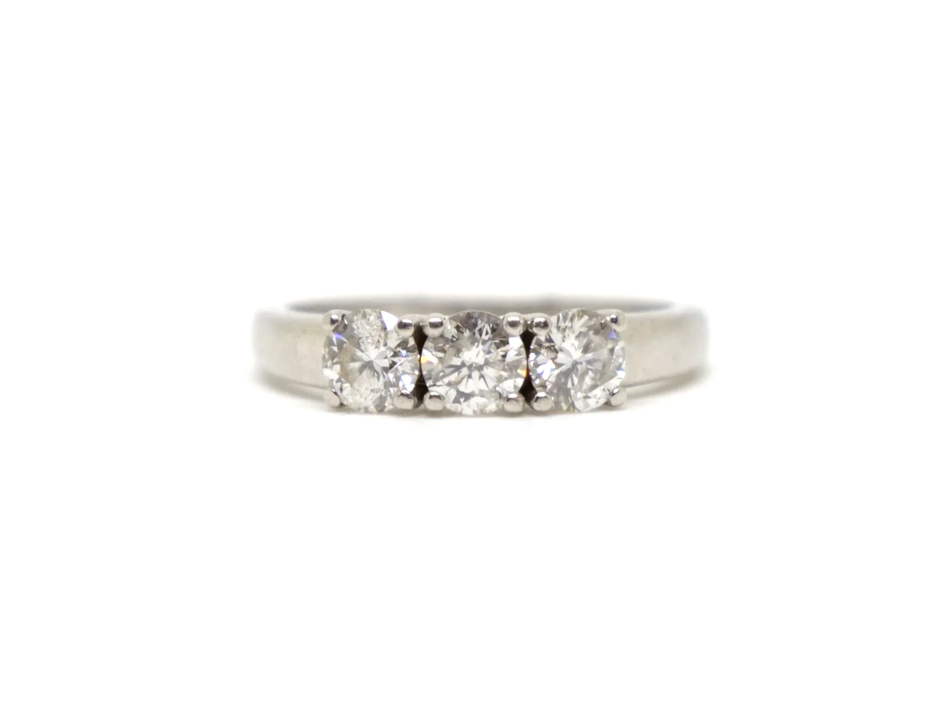 Platinum diamond three stone ring, round brilliant cut diamonds