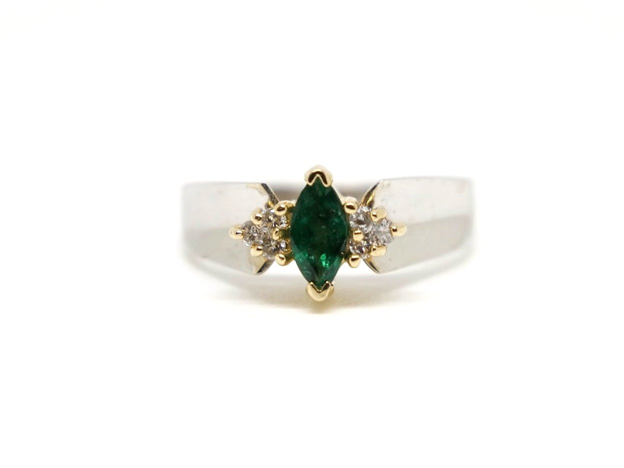 Lovely vintage 14ct gold emerald and diamond ring, set with a central marquise cut emerald with small diamonds to each shoulder.