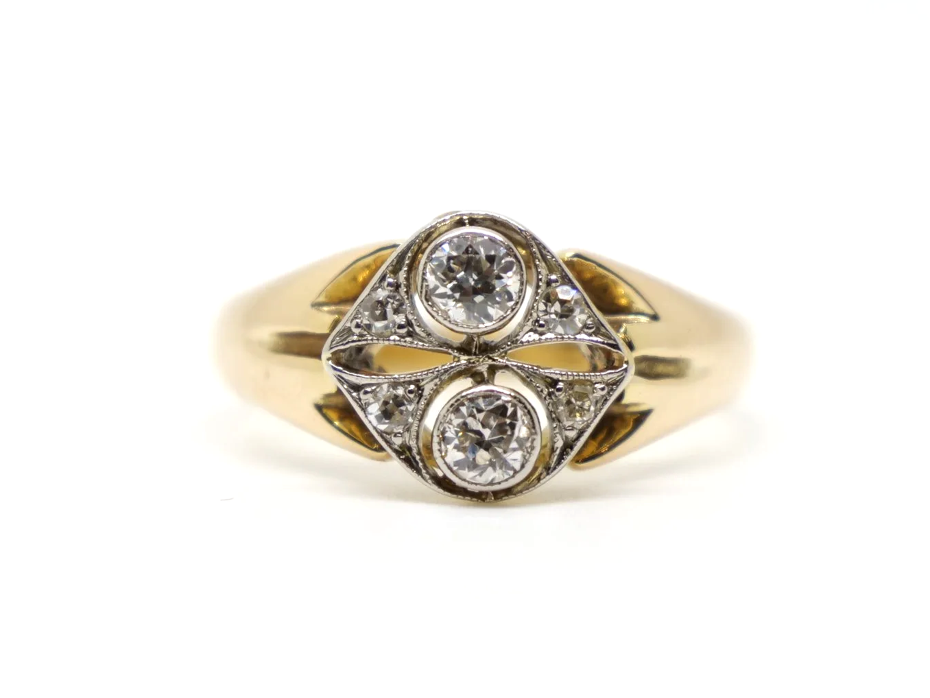 Beautiful 18ct gold Art Deco ring, set with two old cut diamonds in a North South design, with four further diamonds in this lovely design.
