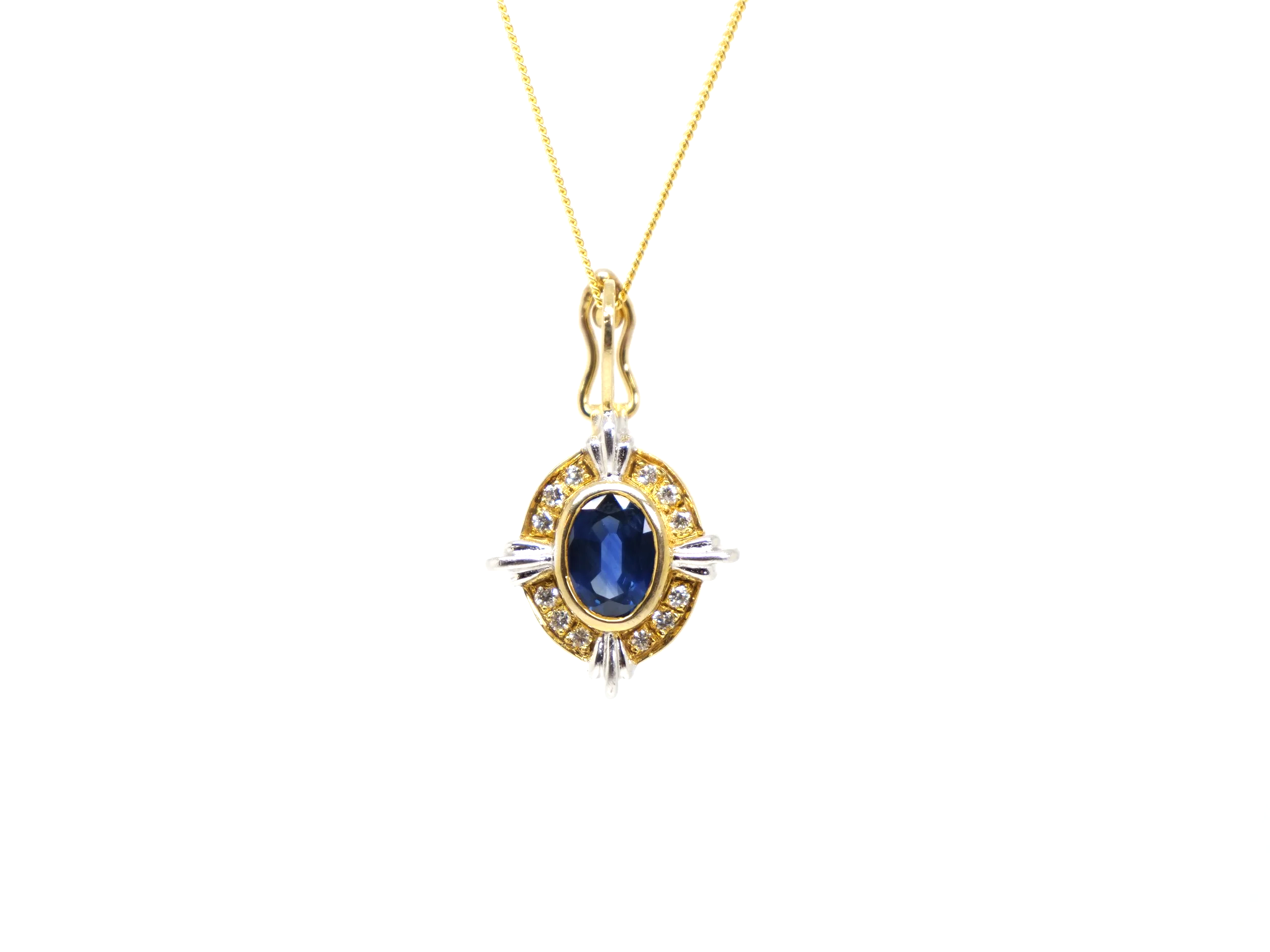 Super 18ct gold vintage 1ct sapphire and diamond pendant and chain.