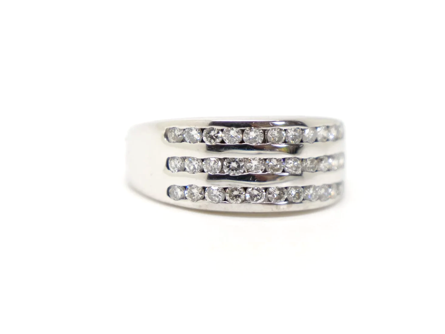 Lovely 18ct gold wide band half eternity ring, set with three rows of brilliant cut diamonds.