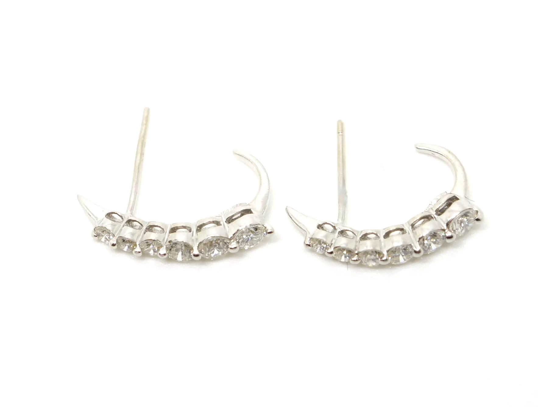 Super 18ct gold diamond hoop earrings, each set with six graduated diamonds with a total approximate diamond weight of 0.7ct.