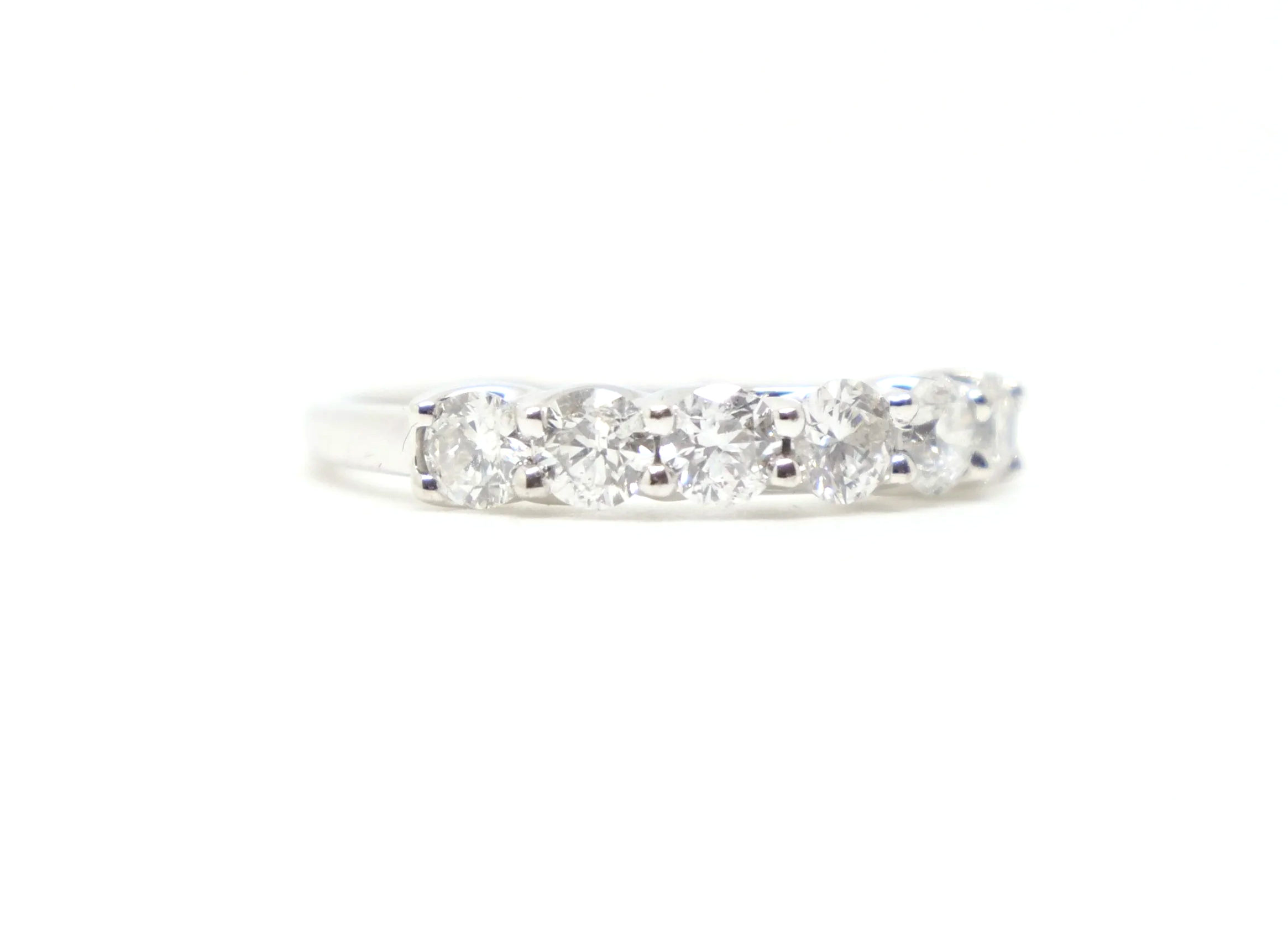 Classic platinum diamond half eternity ring, set with six brilliant cut diamonds with a total diamond weight of 1ct.