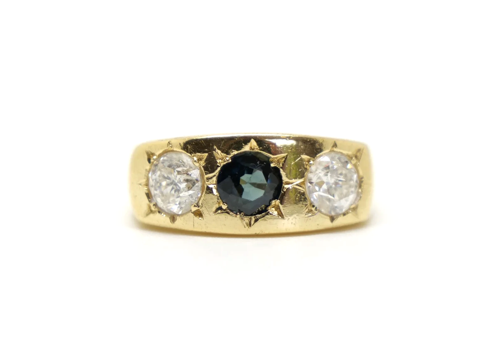 Lovely heavy vintage 18ct gold gypsy ring, set with a round cut sapphire and two brilliant cut diamonds measuring approximately 1ct total.