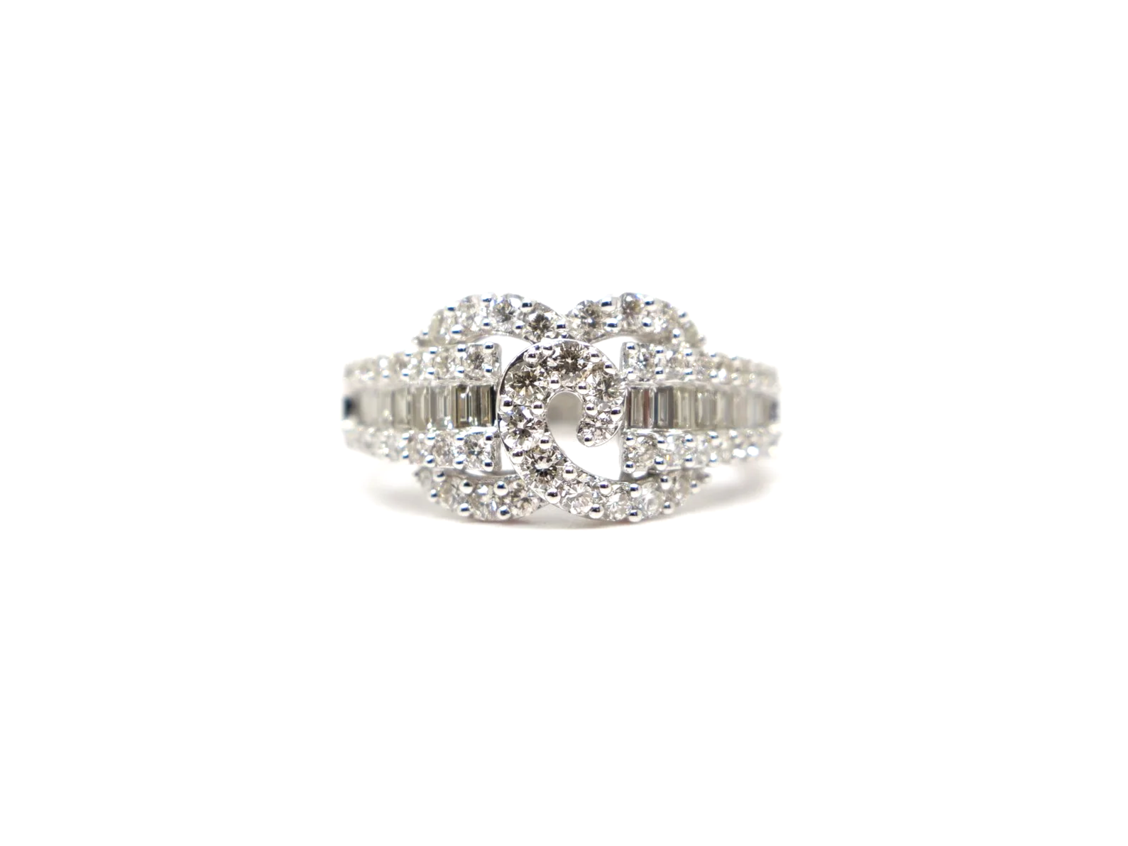 platinum diamond statement ring set with a combination of round brilliant and baguette cut diamonds totalling 1.258 carats.