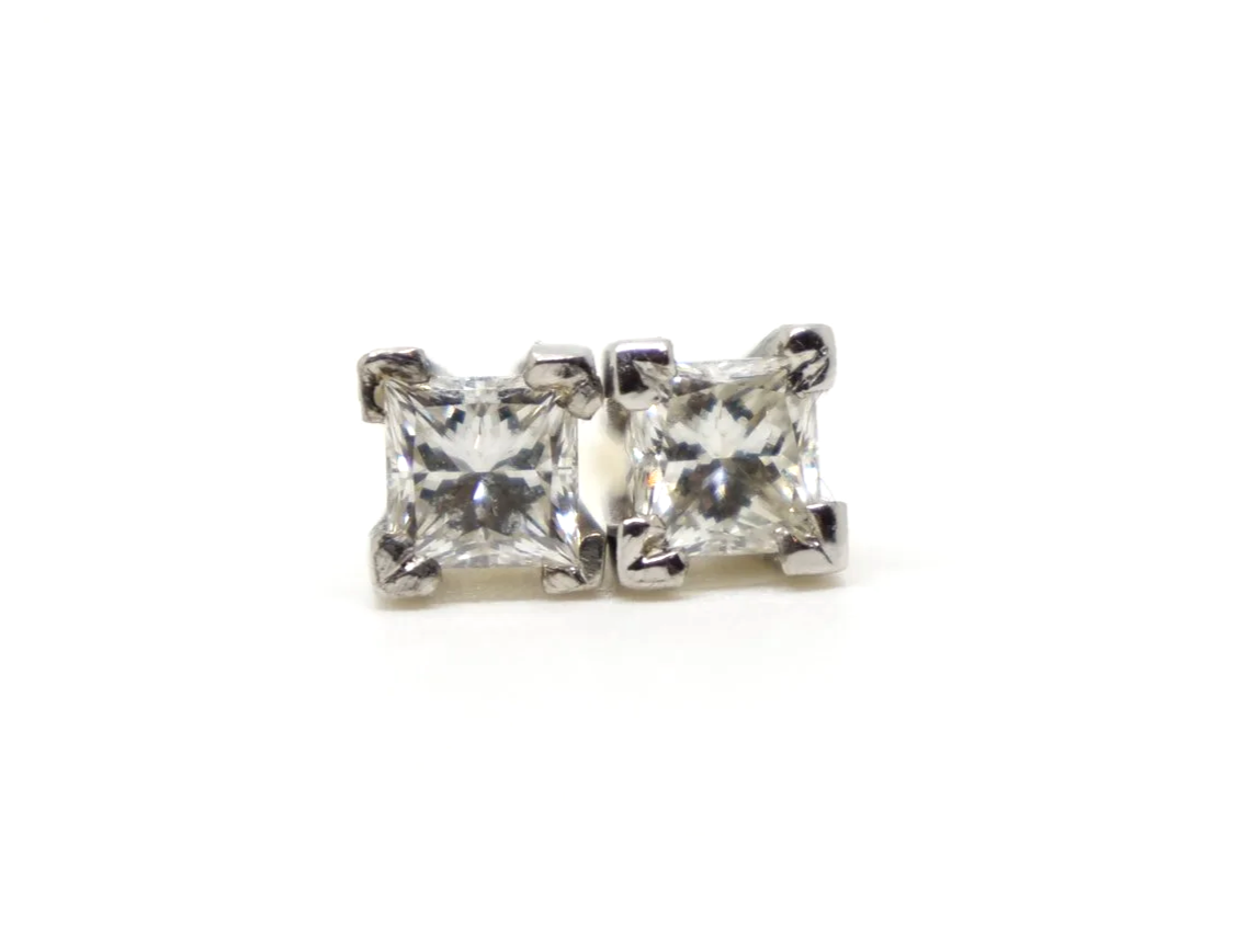 Super 18ct gold princess cut diamond stud earrings, each approximately 0.45ct (0.9ct total). With 18ct gold butterfly backs.