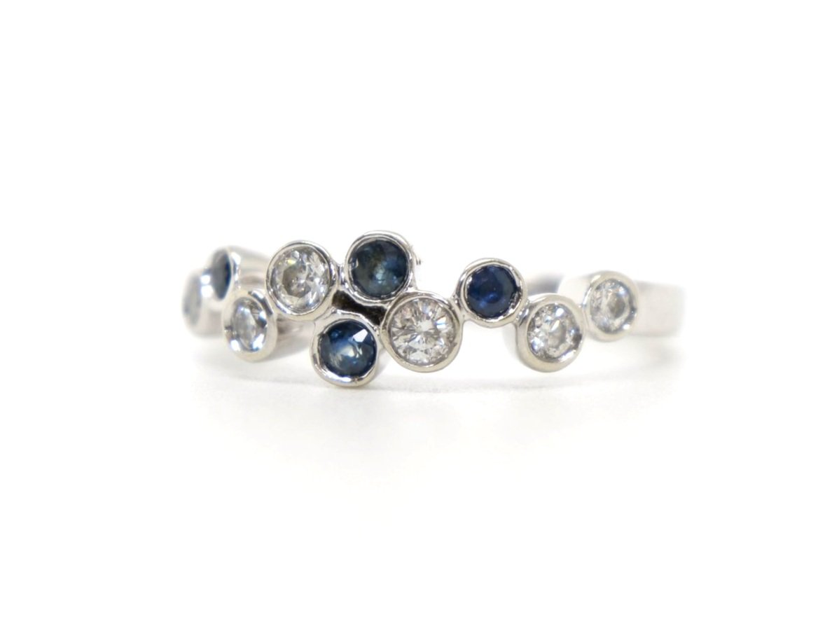 Unusual contemporary 9ct gold sapphire and diamond bubble style ring, set with four sapphires and six diamonds.