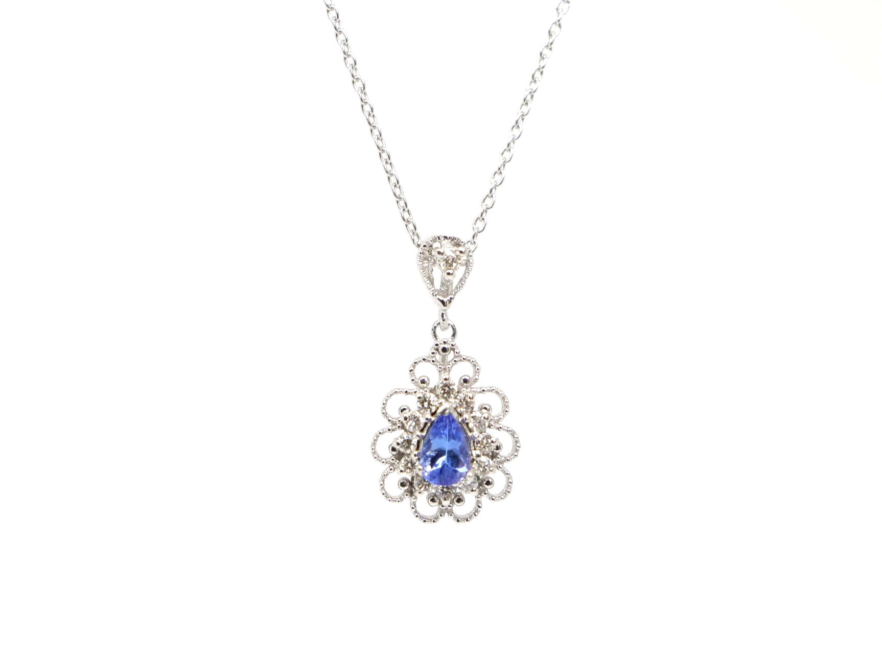 Lovely 18ct gold tanzanite and diamond pear shaped pendant and chain.