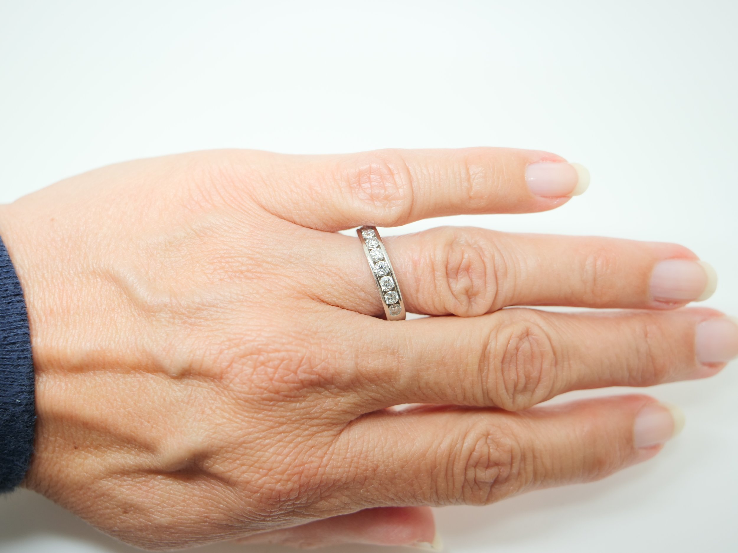 platinum channel-set diamond half eternity ring set
