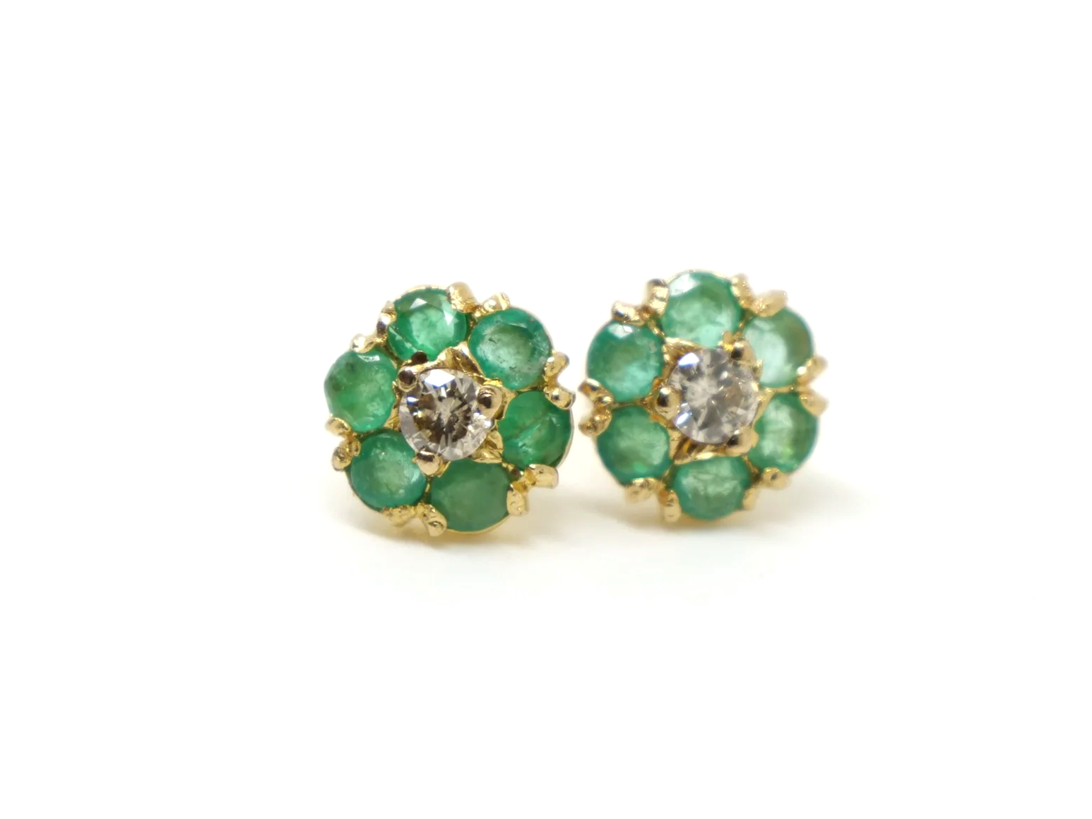pretty pair of emerald and diamond daisy design vintage earrings in 9ct yellow gold, dating from 1975