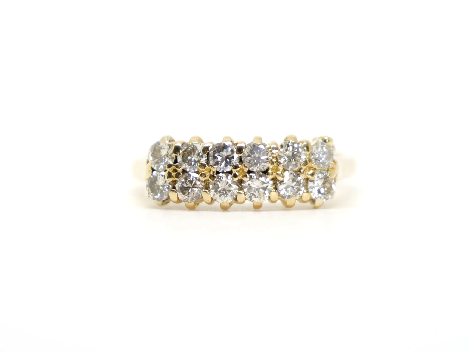 A double row diamond ring in 18ct yellow gold — fourteen round brilliant cut diamonds arranged in two parallel rows, totalling approximately 1.2 carats