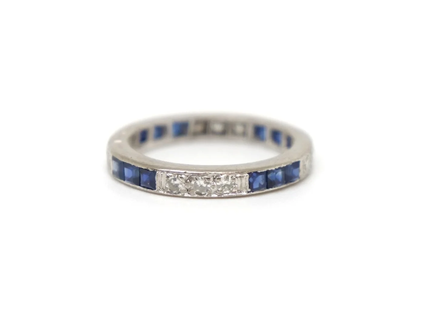 Super vintage 18ct gold sapphire and diamond full eternity ring, set with twelve calibre cut sapphires and twelve diamonds, placed in sets of four around the ring.