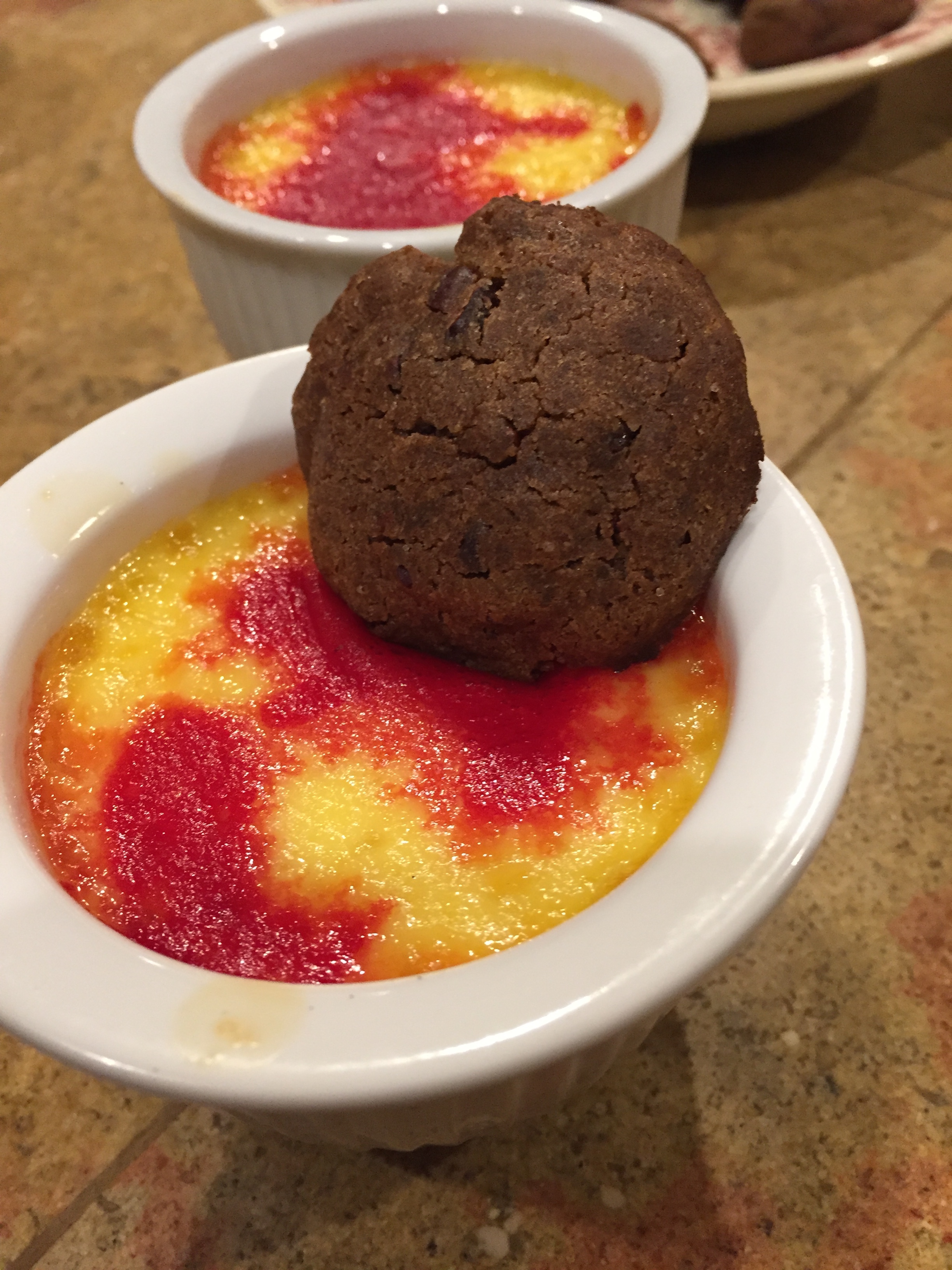 Prickly Pear Brulee' with Cacao Nib Cookie.