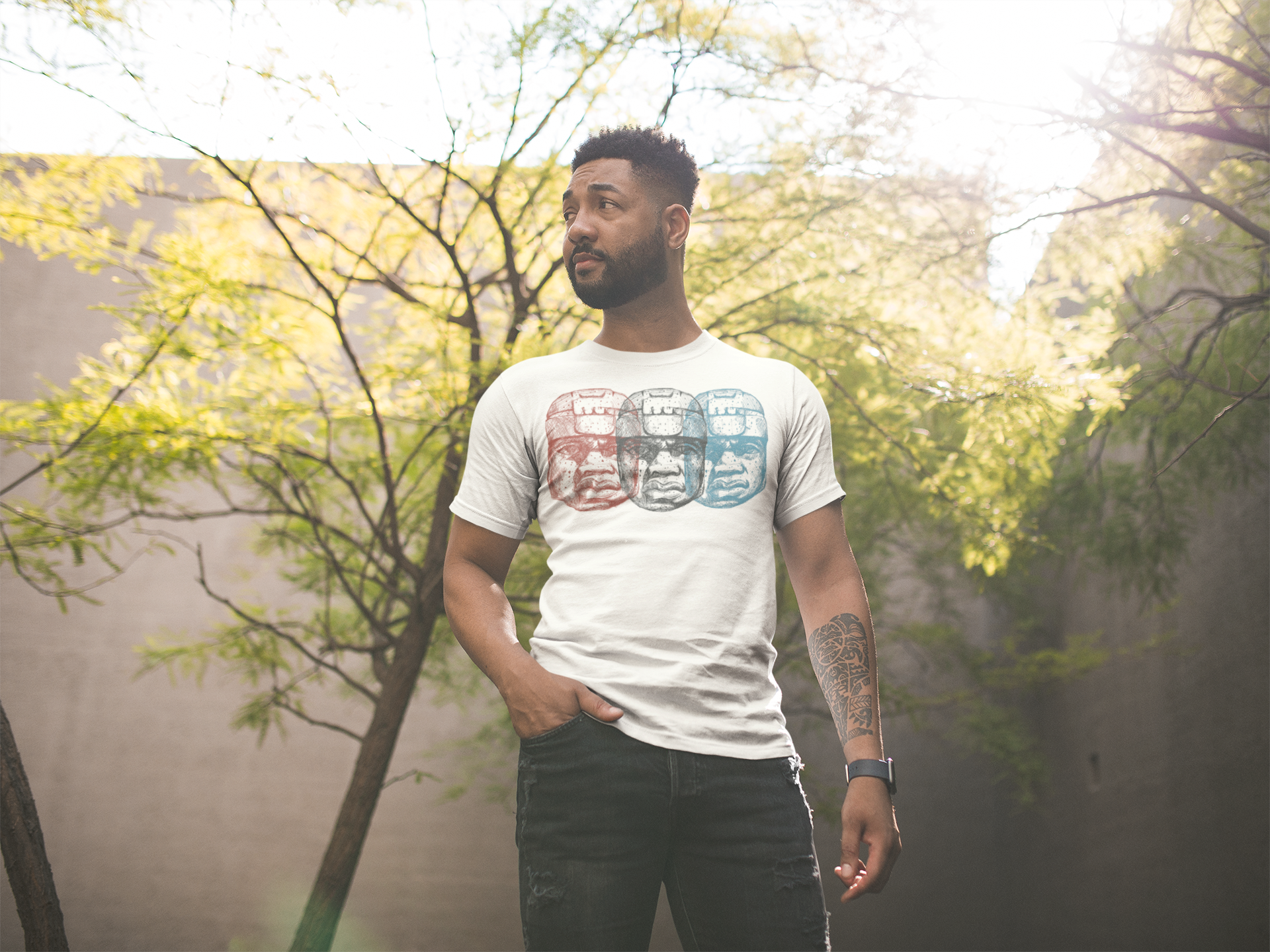 mockup-of-a-man-with-a-tshirt-and-black-jeans-against-a-tree-21351.png