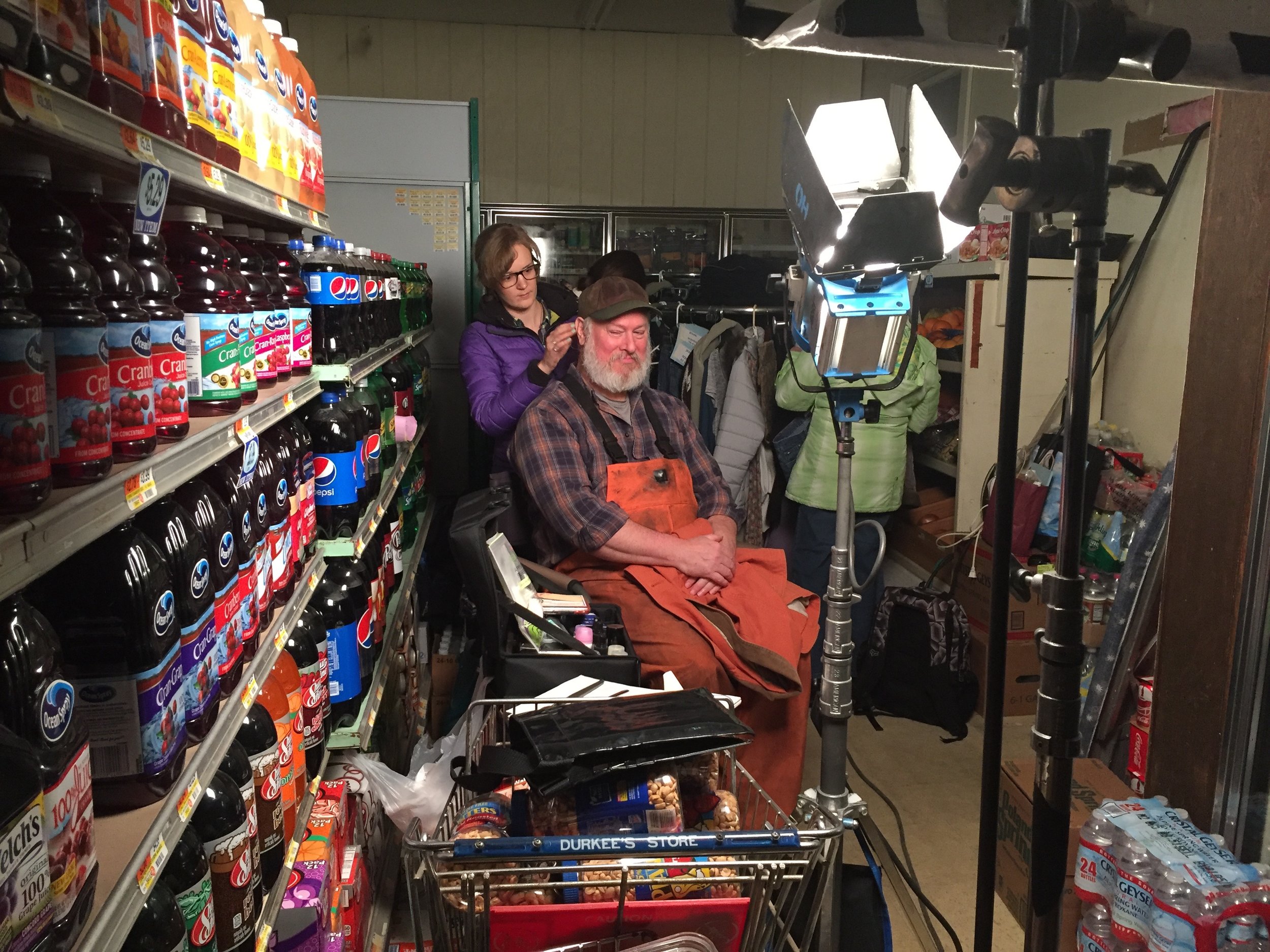 Make-up and hair stylist Alisha Cratty works on Joseph Klapatch at Durkee's on Isleboro