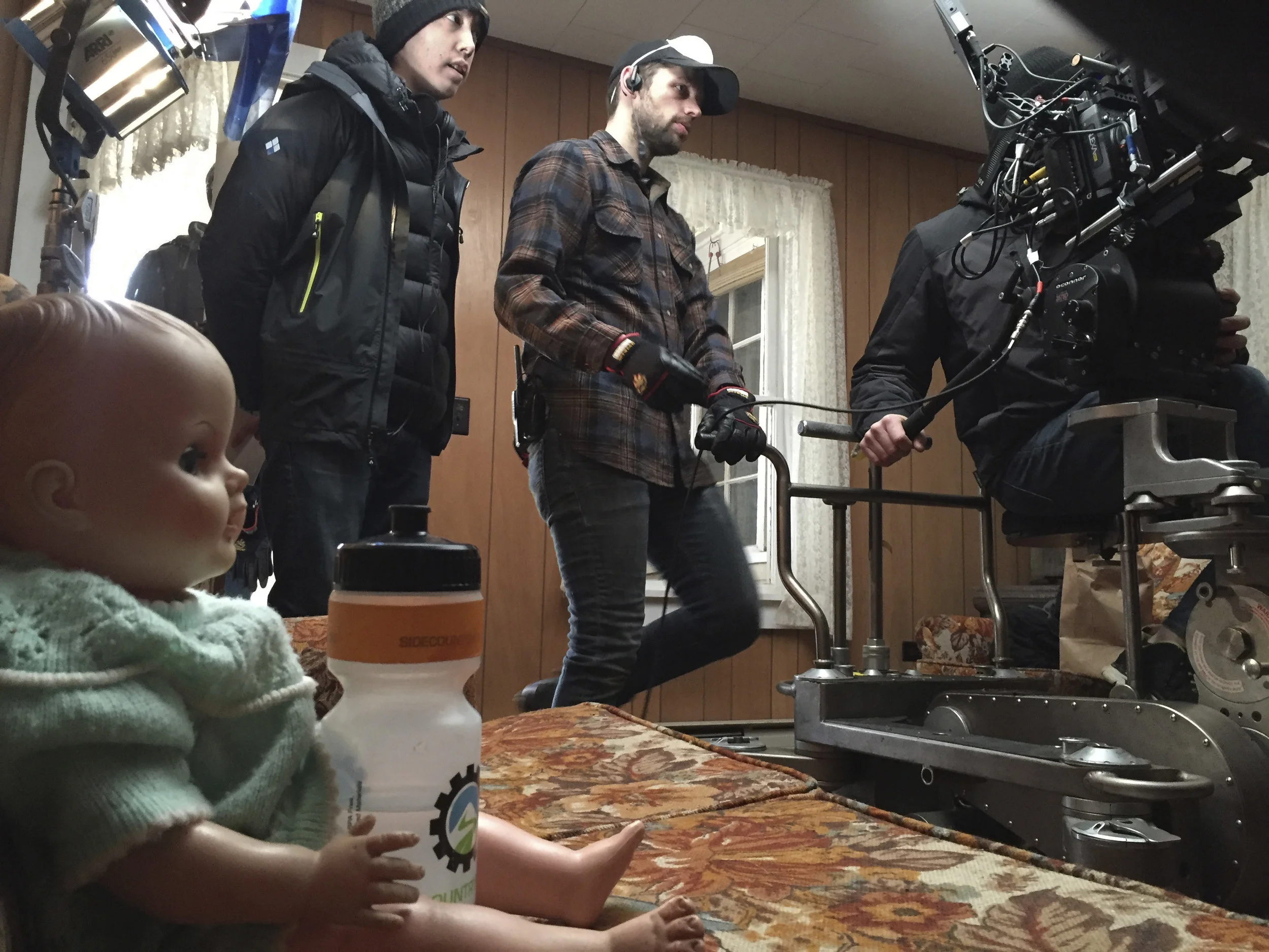 Director Josh Gerritsen and dolly grip Adam Belanger in the abandoned house