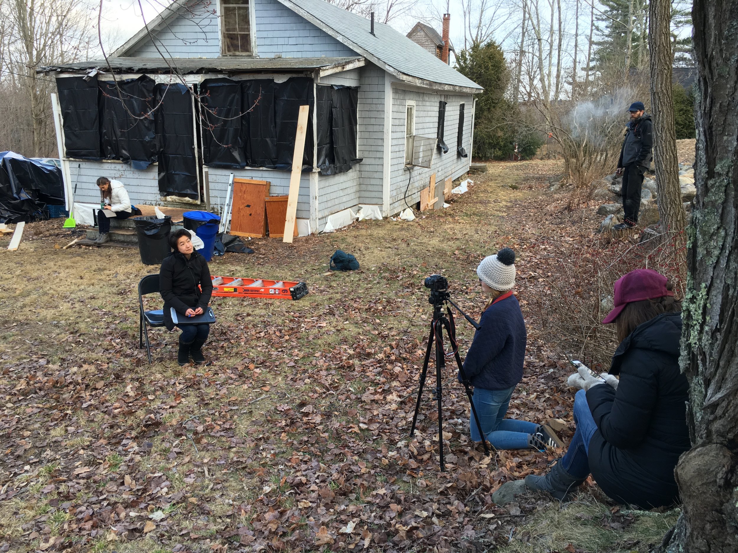 Our intern Jade Hazzard interviews line producer Candice Kuwahara during a break outside the abandoned house