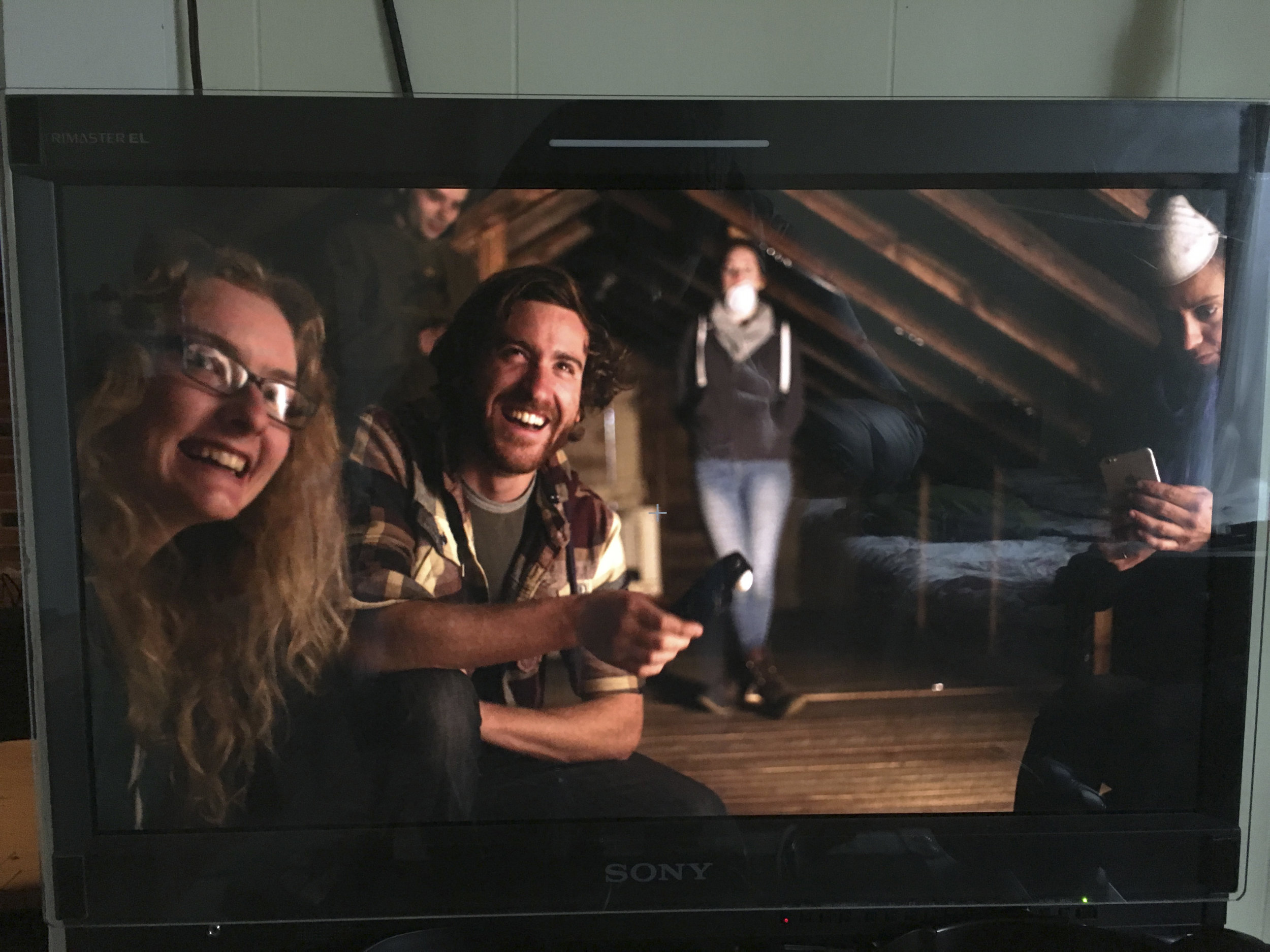 The crew goofs off in the attic of the abandoned house