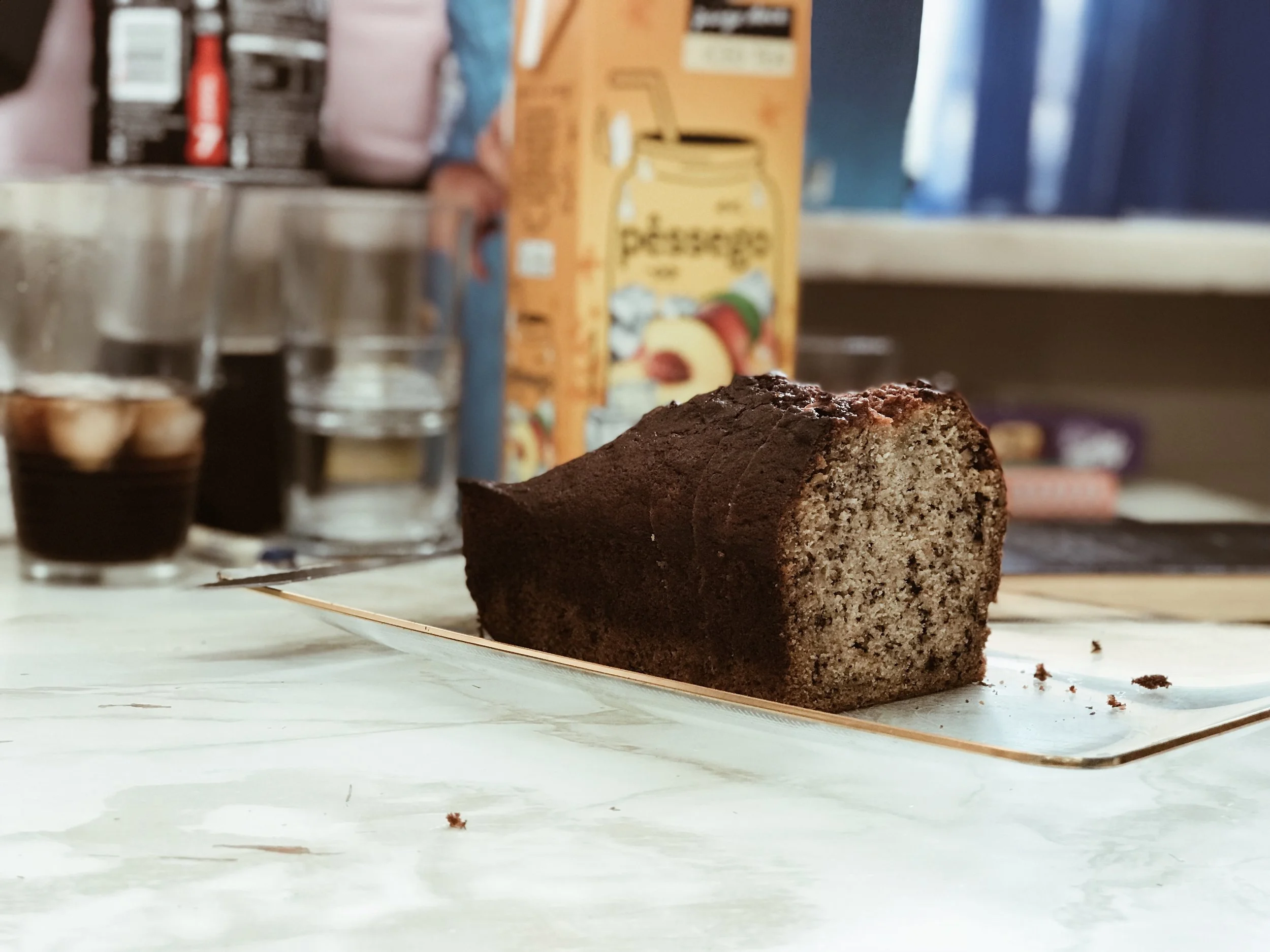 Banana cake and other snacks displayed on the table for clients and volunteers.
