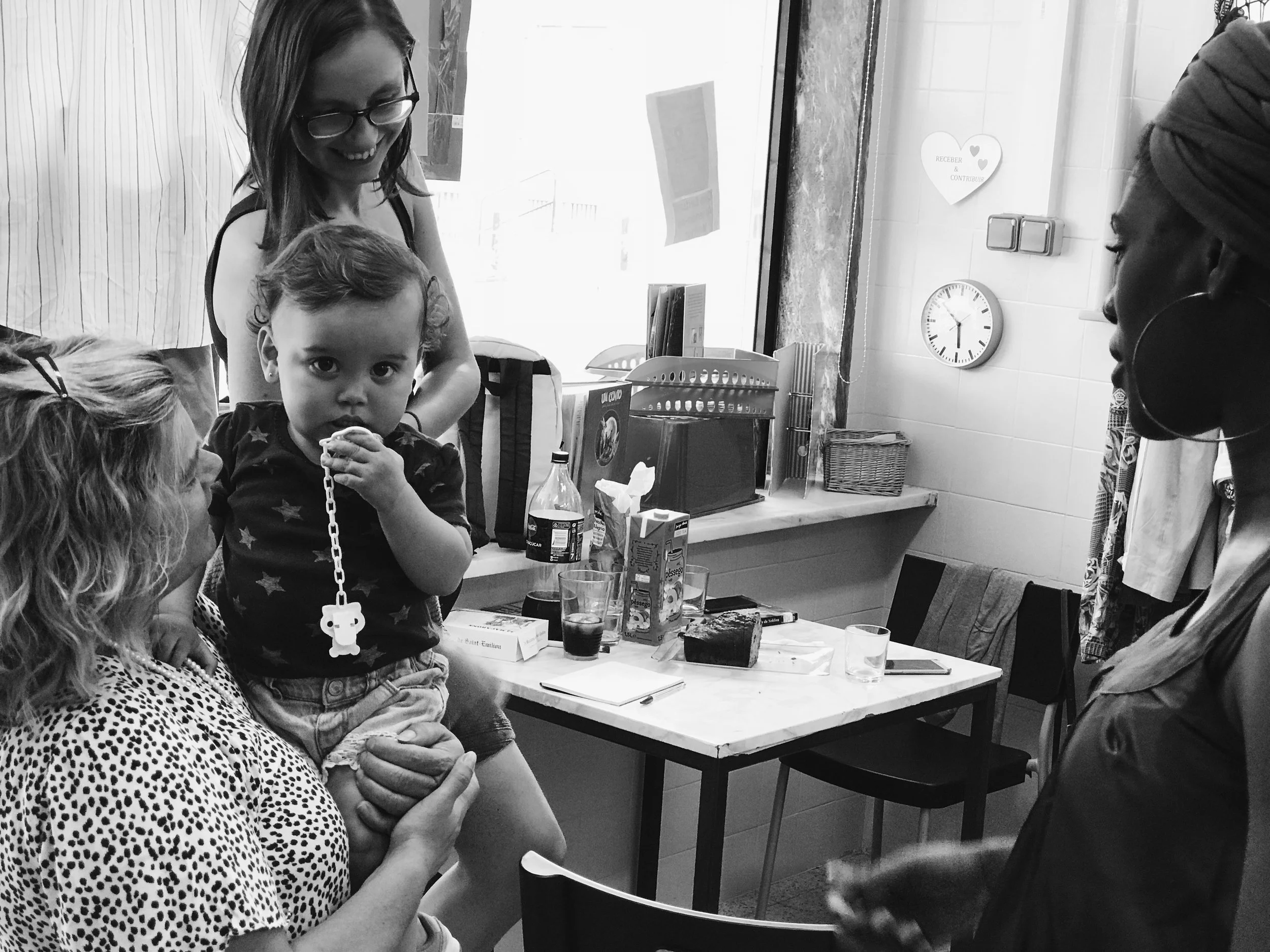 Client family stops by to say hello to volunteers and Maria.