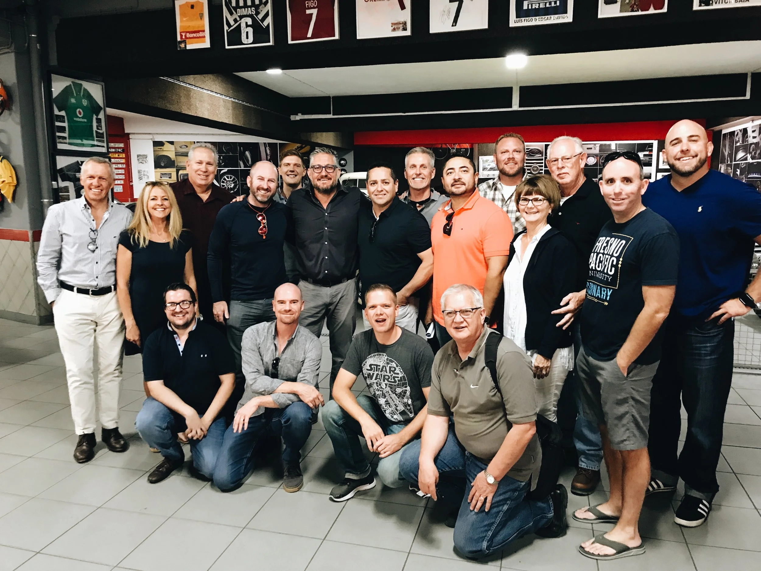 Group poses for a picture with Tim Vieira, entrepreneur and judge of Portugal’s version of Shark Tank, after visiting one of his businesses