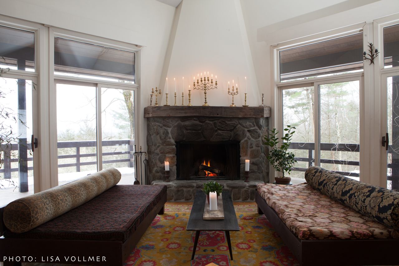 Race Mountain House living room sunken couches and fireplace