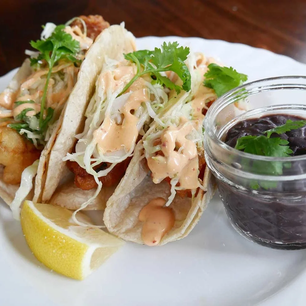 Newly added to this week's menu at The Stagecoach Tavern: Crispy fish tacos with cilantro slaw and chipotle aioli. Served with a side of black beans.