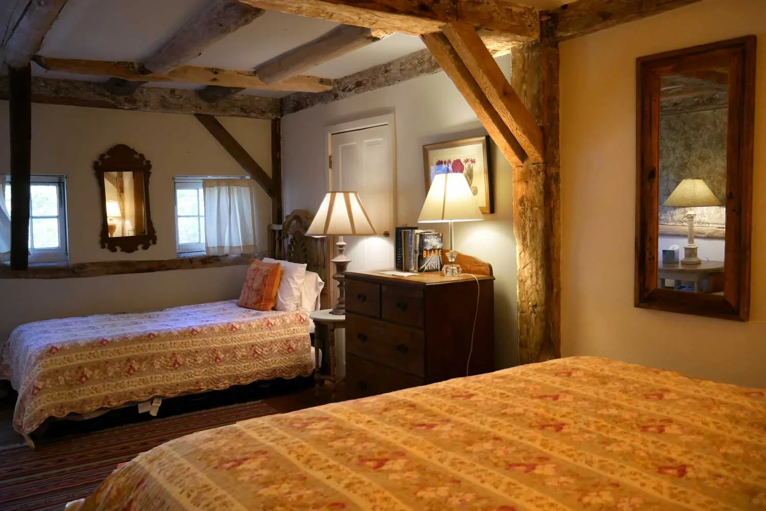 LOCATION: Main Lodge, Ground Level DETAILS: Heavy beam ceiling, cool and spacious. Queen and twin (with trundle), bathroom with tub and shower, private entry, sleeps 4. Dog-friendly. 20’x12’