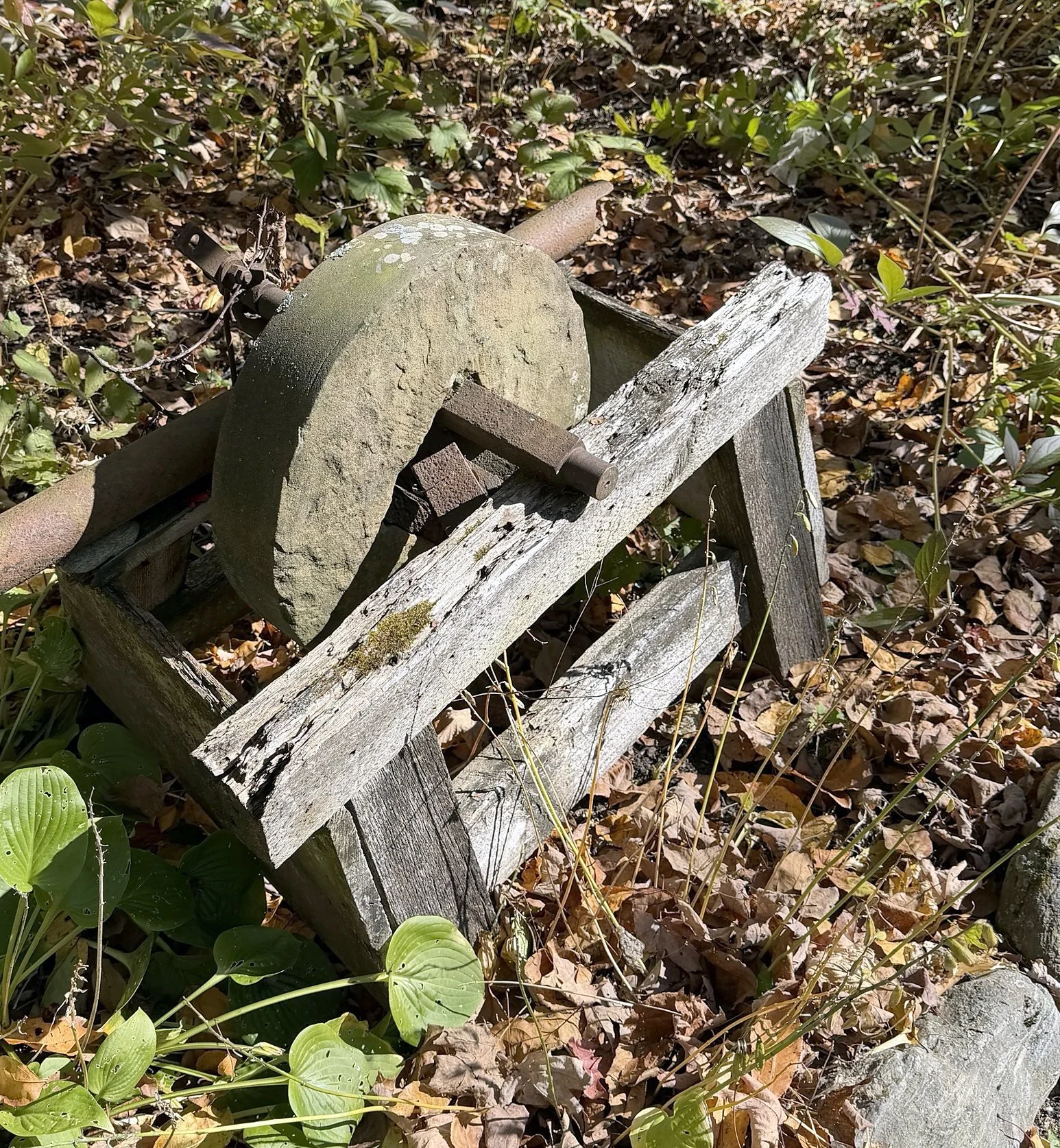 077 Antique sandstone grindstone.jpg